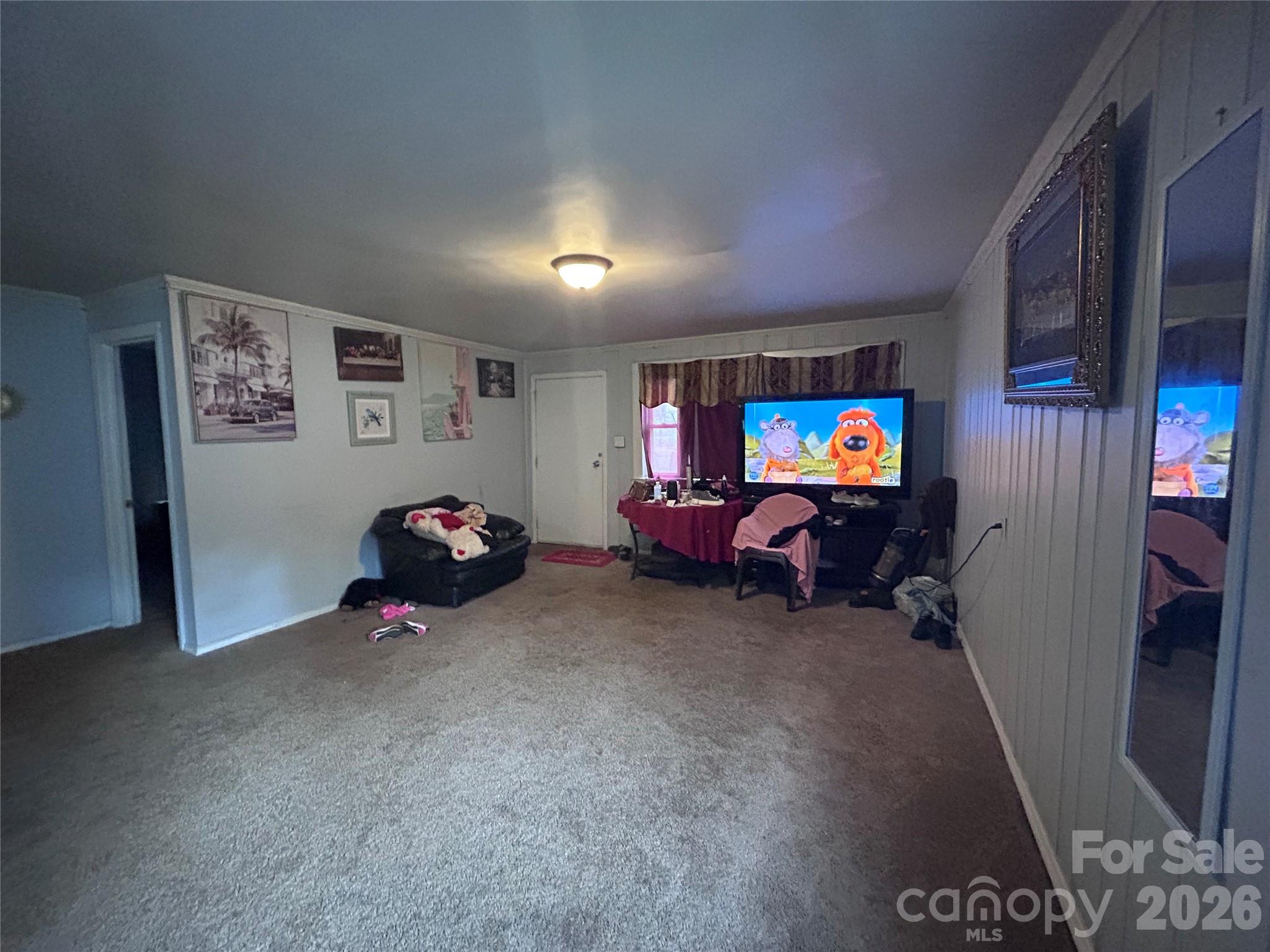 Living room.  Main entrance. - 317 S Yates Street, Gastonia