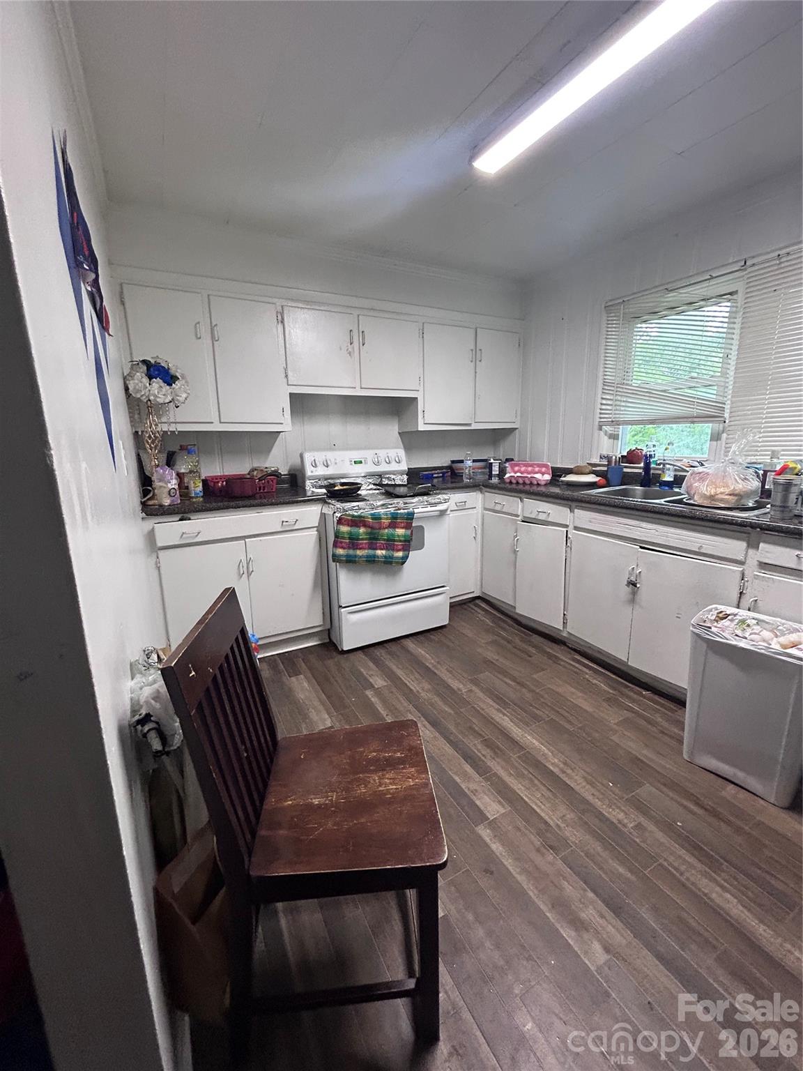 View from breakfast area looking into the kitchen. - 317 S Yates Street, Gastonia