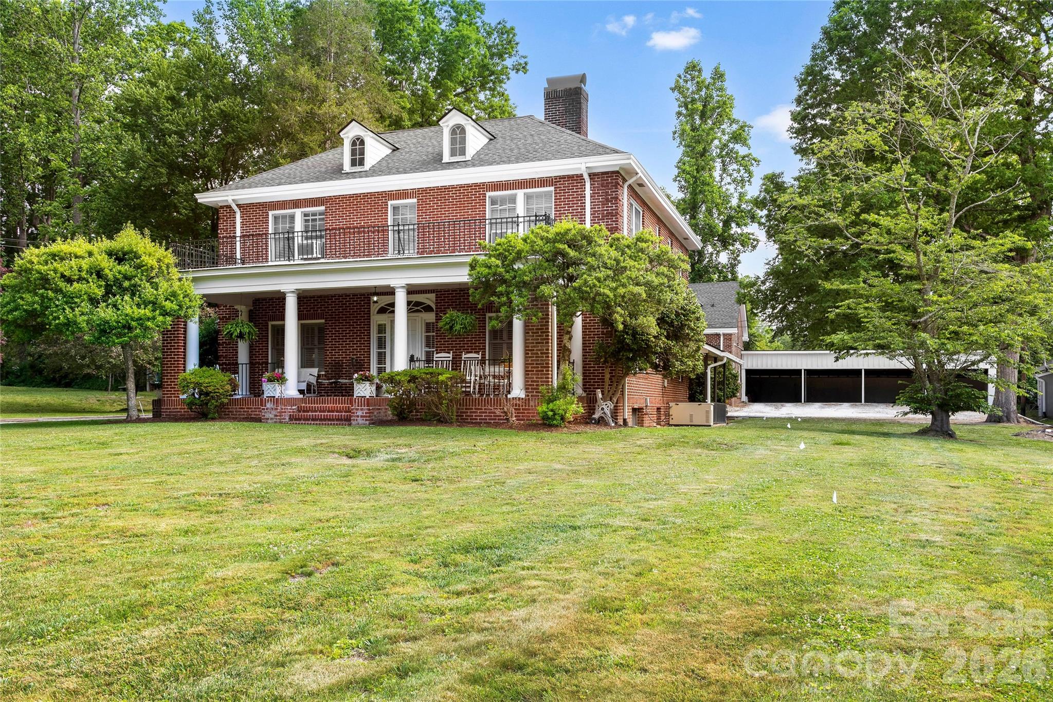 Right side of home looking into the rear parking area - 1518 Greenville Highway, Hendersonville