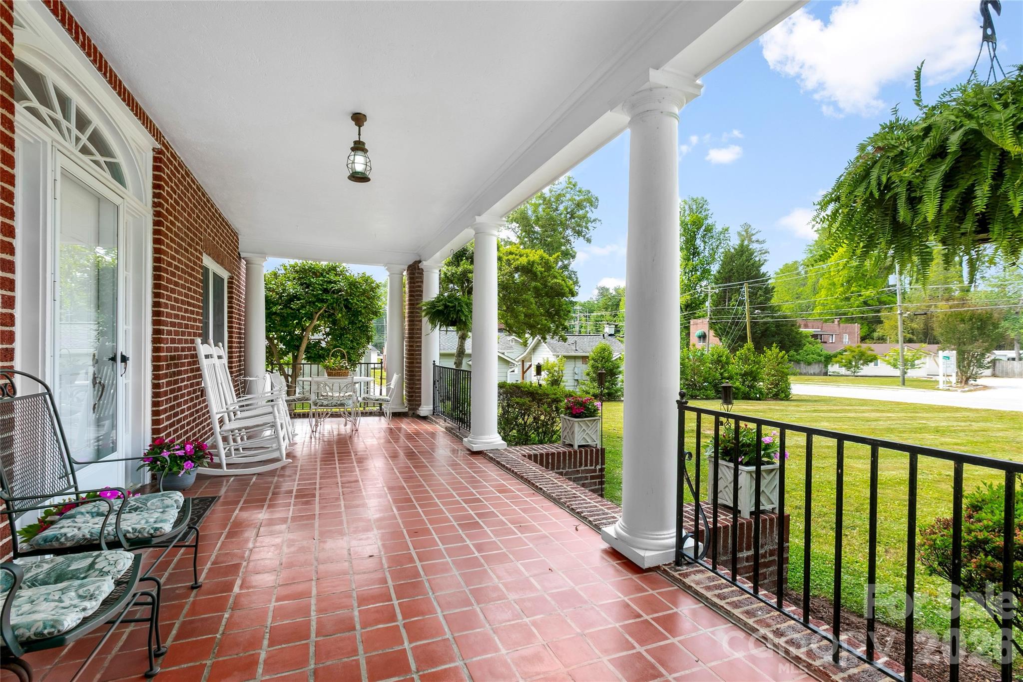 Front porch along the entire front of the home - 1518 Greenville Highway, Hendersonville