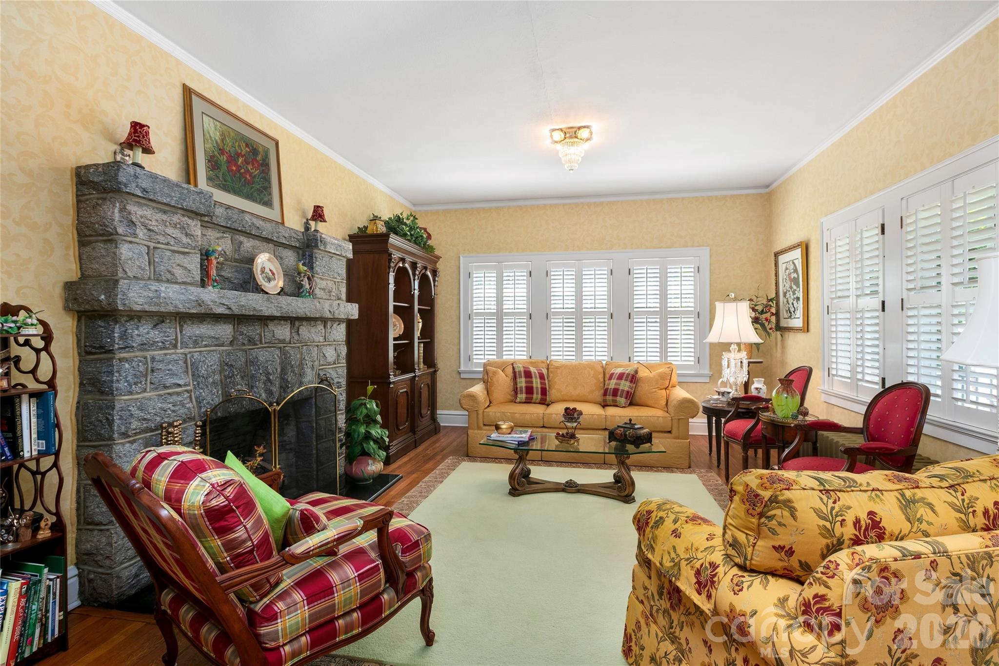 Living room with beautiful sone fireplace. Has gas logs. - 1518 Greenville Highway, Hendersonville