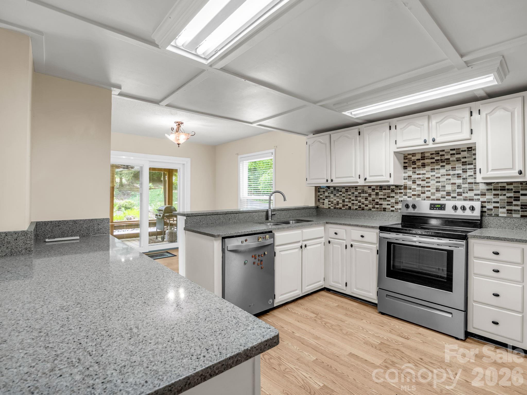 Spacious kitchen, granite counters, stainless appliances - 117 Willow Way, Hendersonville