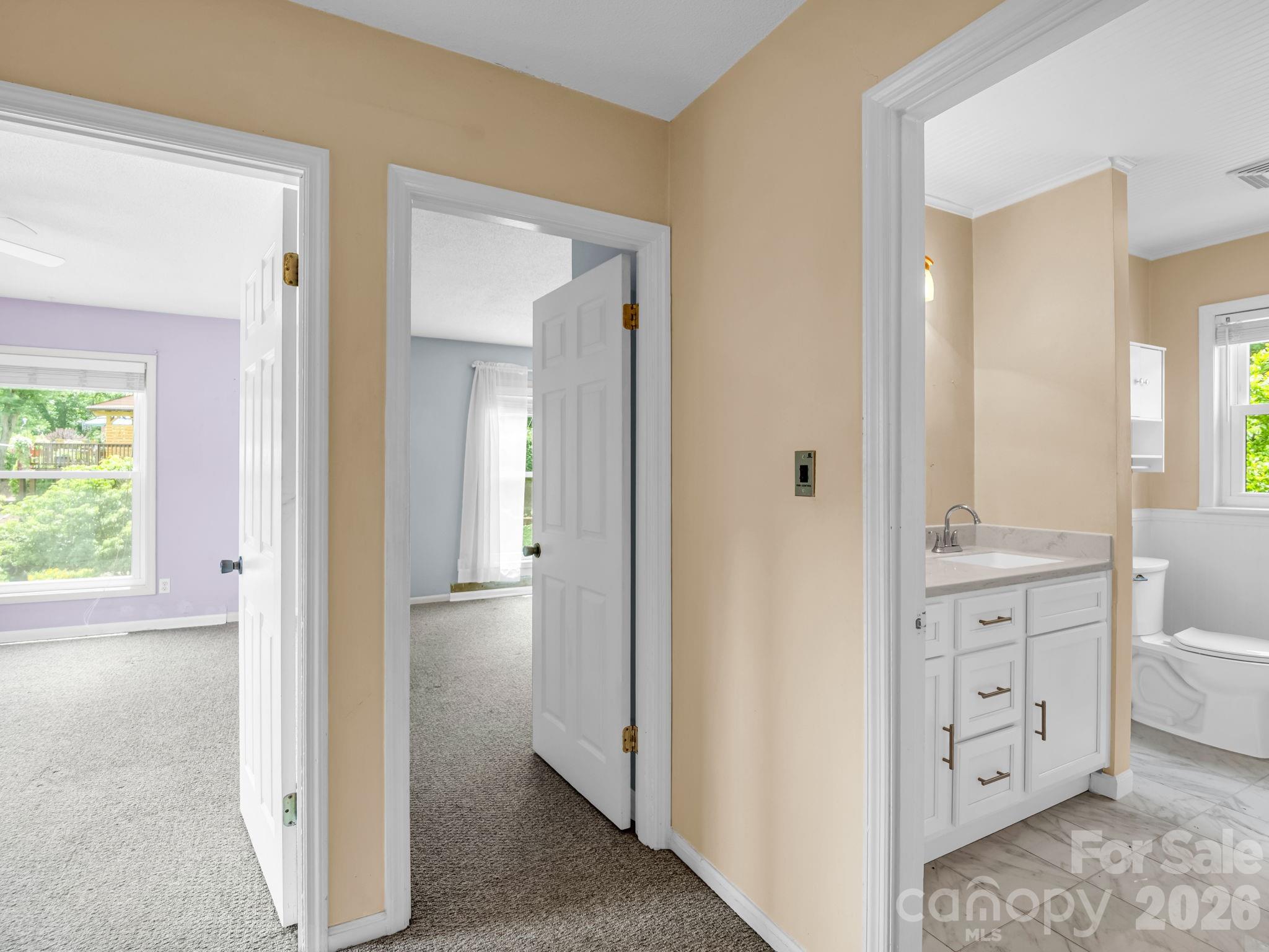 View from landing to 2 upstairs bedrooms and 1 full bath - 117 Willow Way, Hendersonville