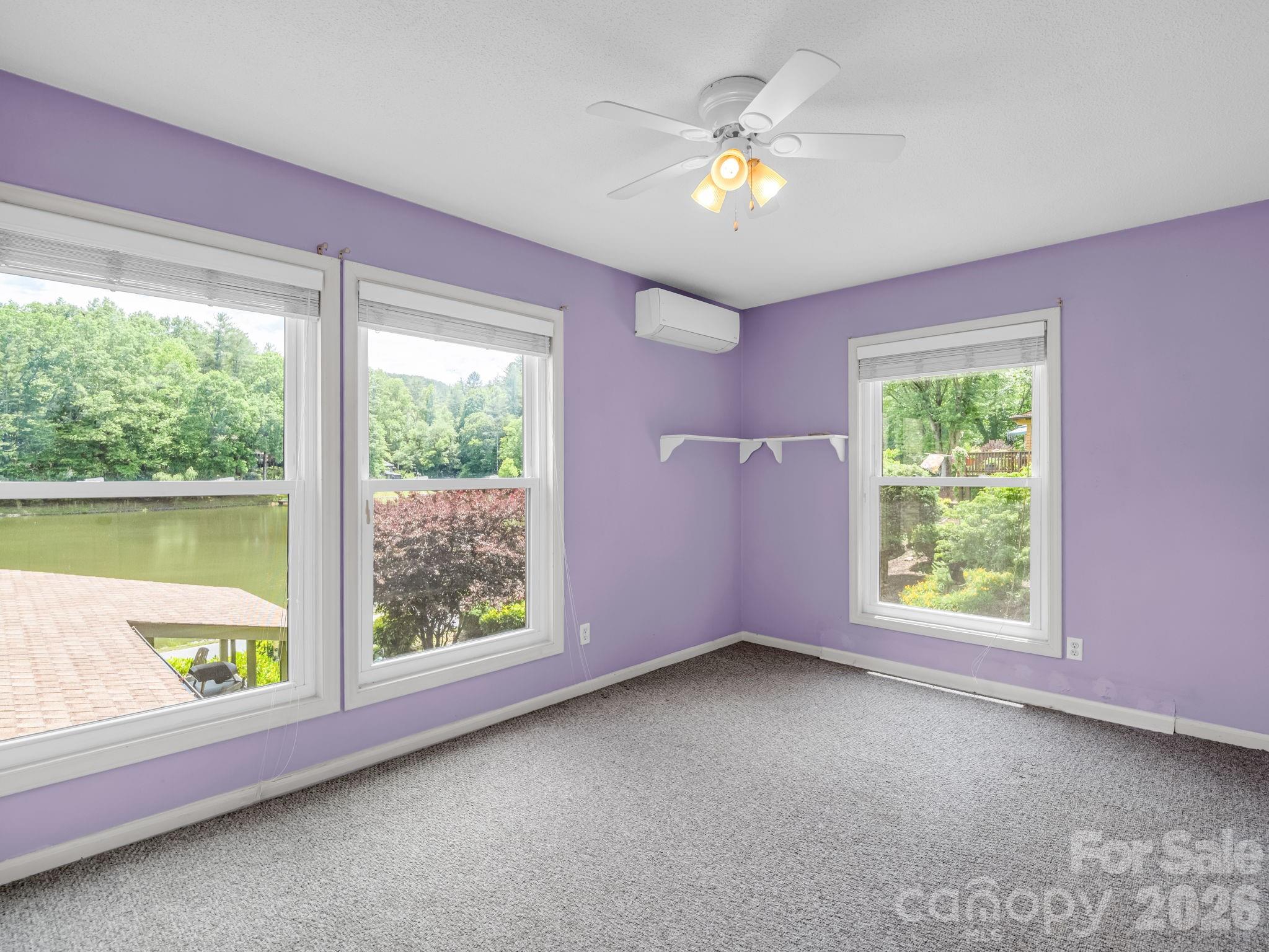 Primary bedroom overlooks lake - 117 Willow Way, Hendersonville