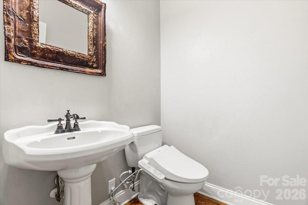 Hall powder room - 126 Carolina Bluebird Loop, Arden