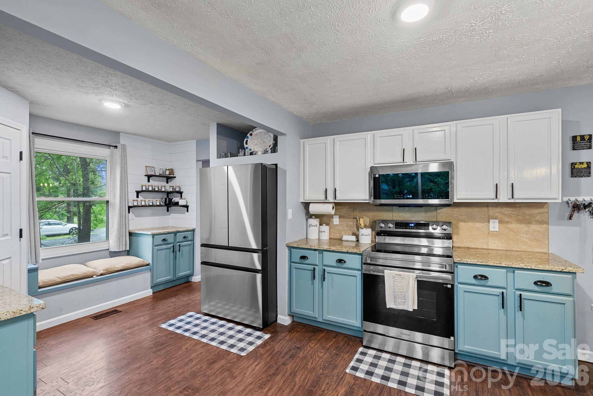 Enjoy the newly installed appliances in this roomy and functional kitchen. - 4 Beechwood Lakes Drive, Hendersonville