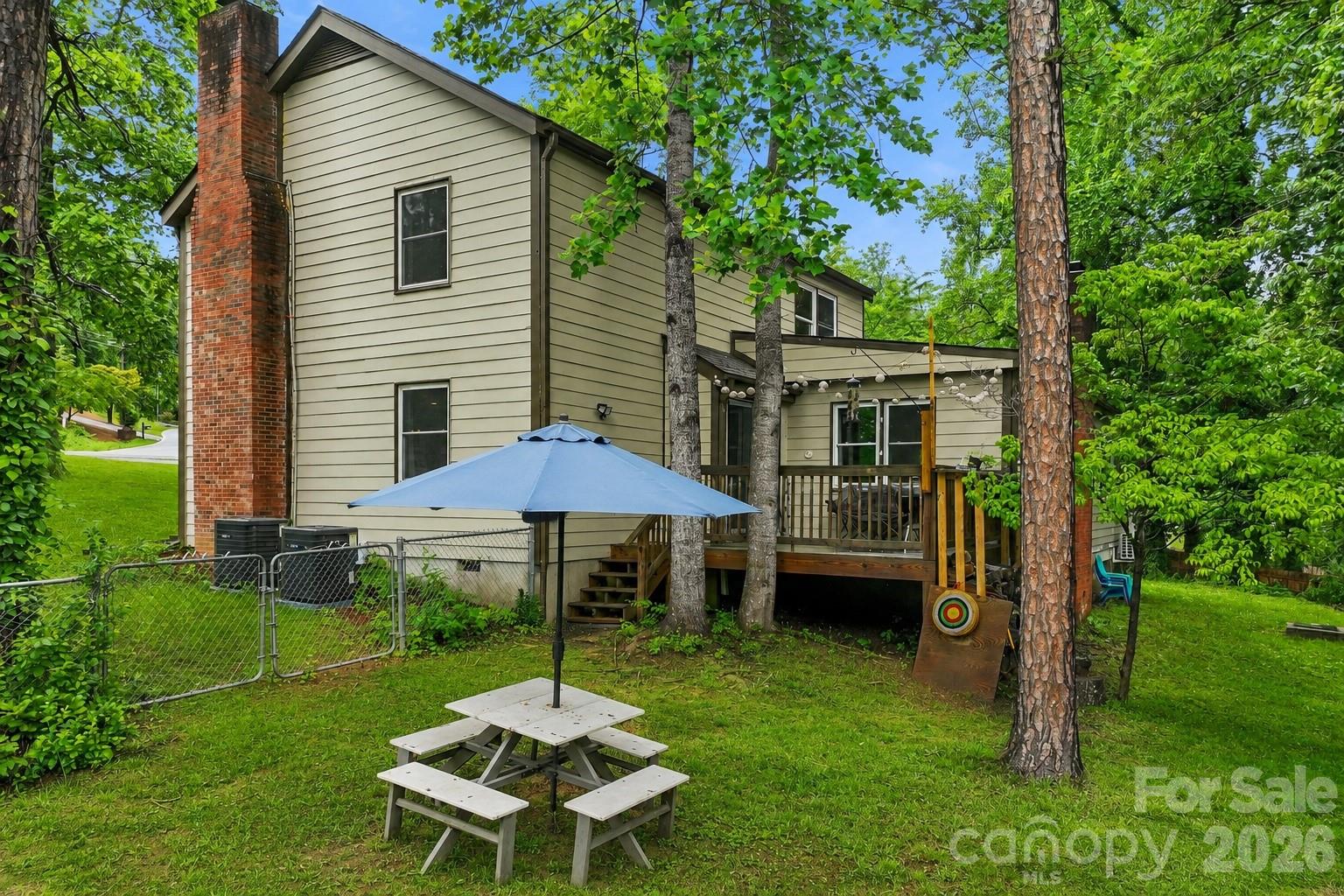 Step off your deck into your fenced back yard - what a perfect spot for a picnic! - 4 Beechwood Lakes Drive, Hendersonville