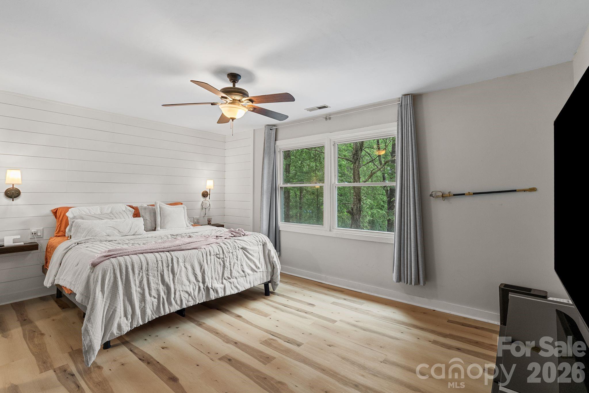 Large windows look out onto your wooded back yard. - 4 Beechwood Lakes Drive, Hendersonville