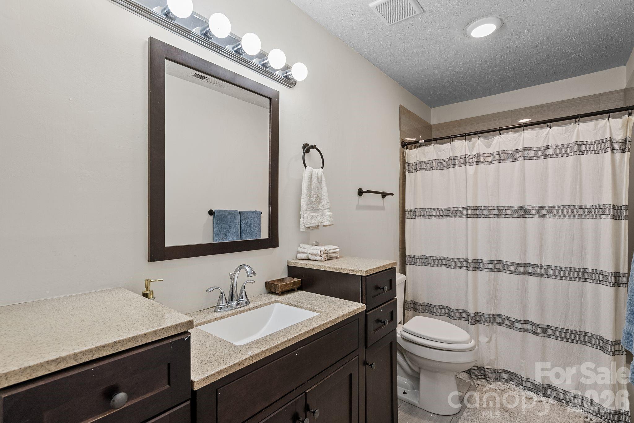 The hall bathroom is also functional and super nice. - 4 Beechwood Lakes Drive, Hendersonville