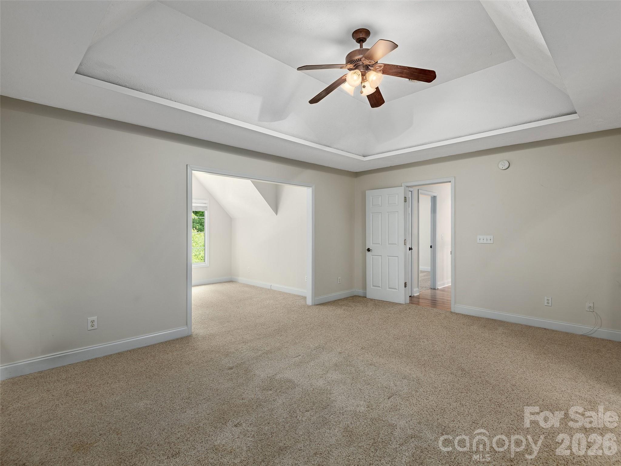 Primary bedroom with sitting area on upper level - 48 Smokemont Drive, Arden