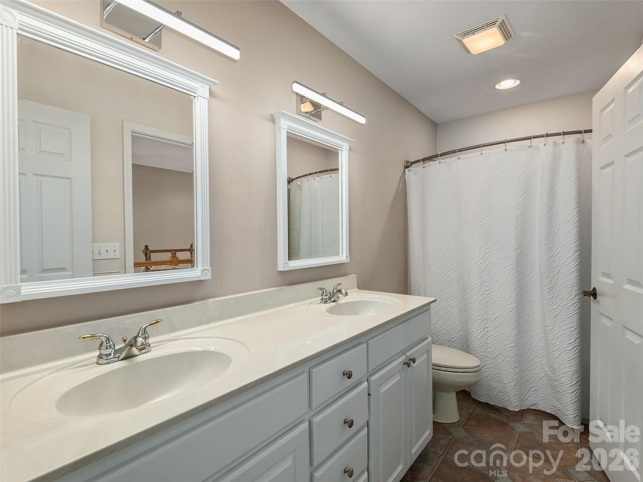 Guest bathroom on upper level with double vanity - 48 Smokemont Drive, Arden