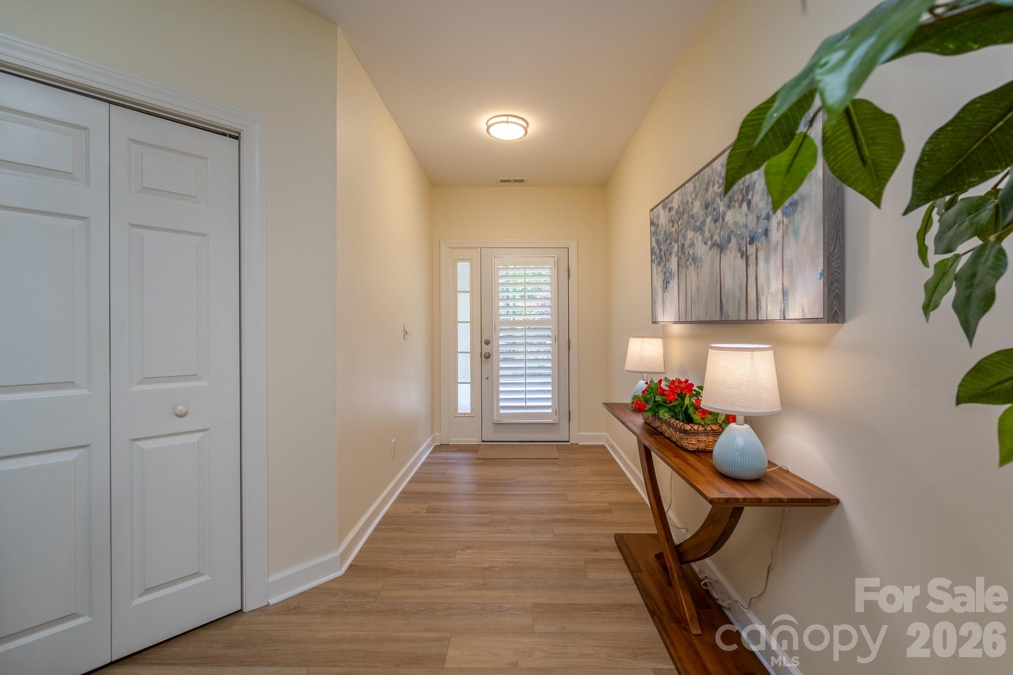 Spacious Foyer Entry – Bright and welcoming foyer with updated flooring and a clean, open design creating a warm first impression upon entry. - 99 Ridgetop Circle, Brevard