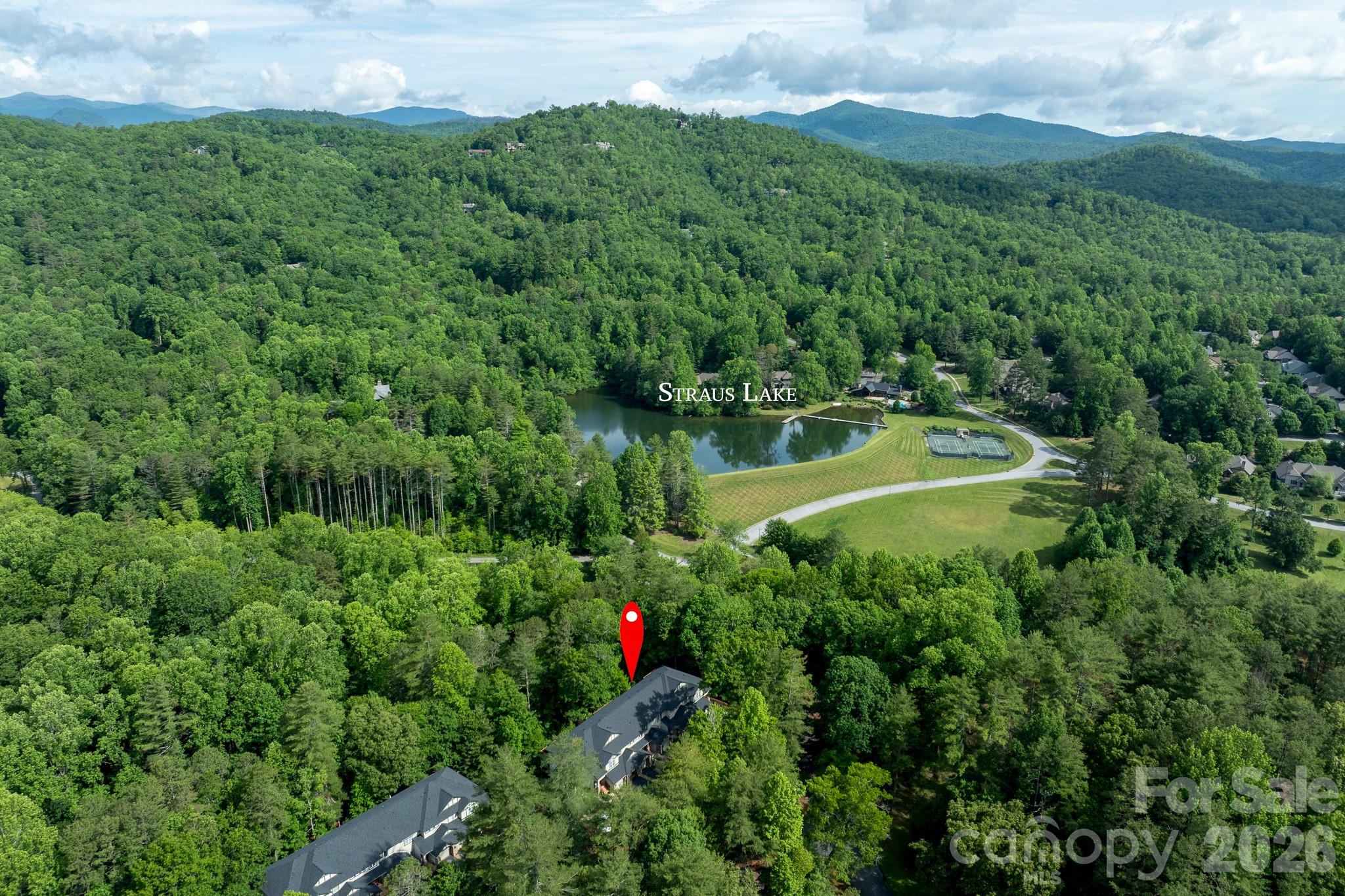Near Straus Lake & Community Amenities – Enjoy proximity to beautiful Straus Lake, walking areas, tennis courts, and neighborhood amenities surrounded by mountain scenery. - 99 Ridgetop Circle, Brevard