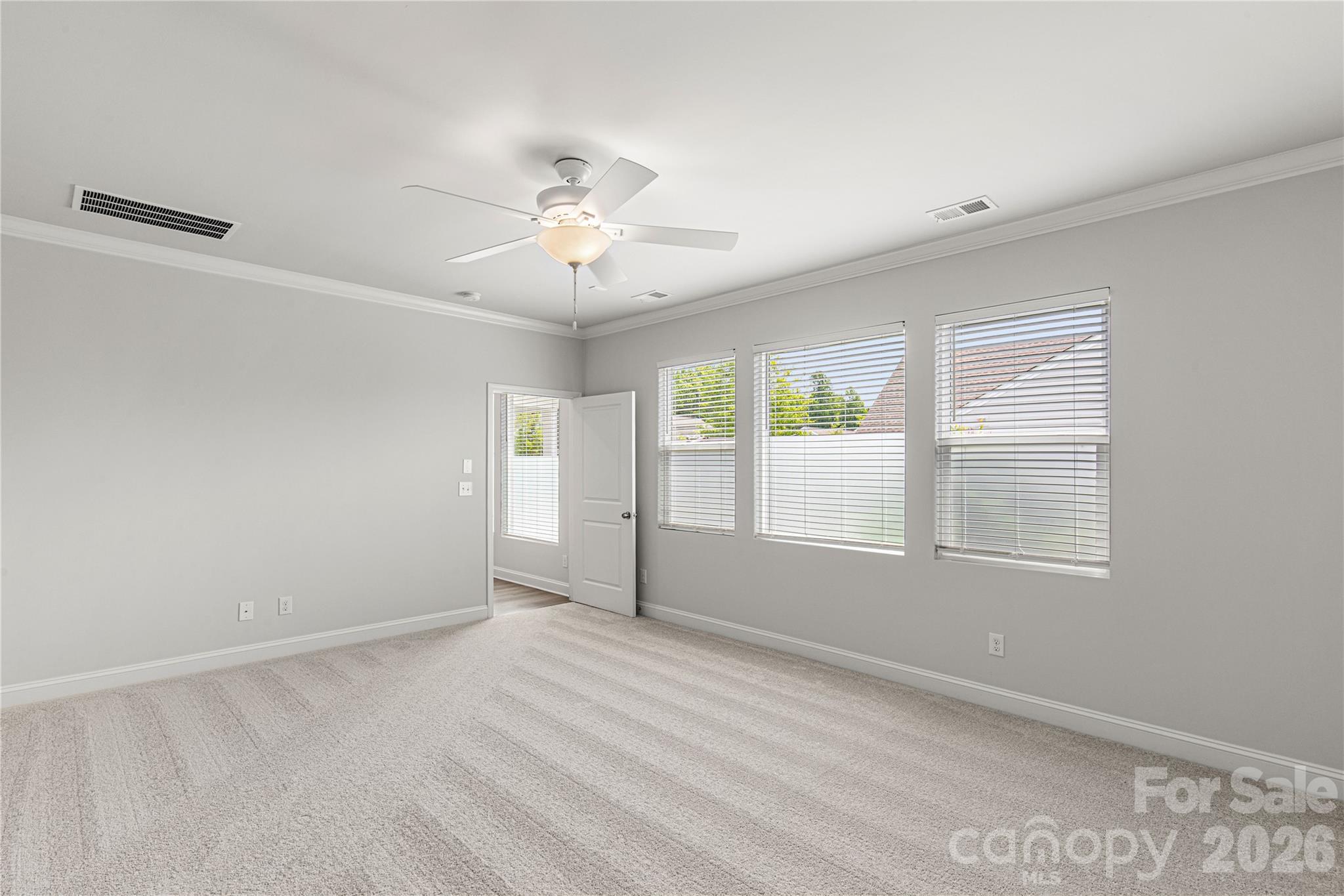 Primary bedroom suite on main level with - 1025 Ansley Park Drive, Indian Land