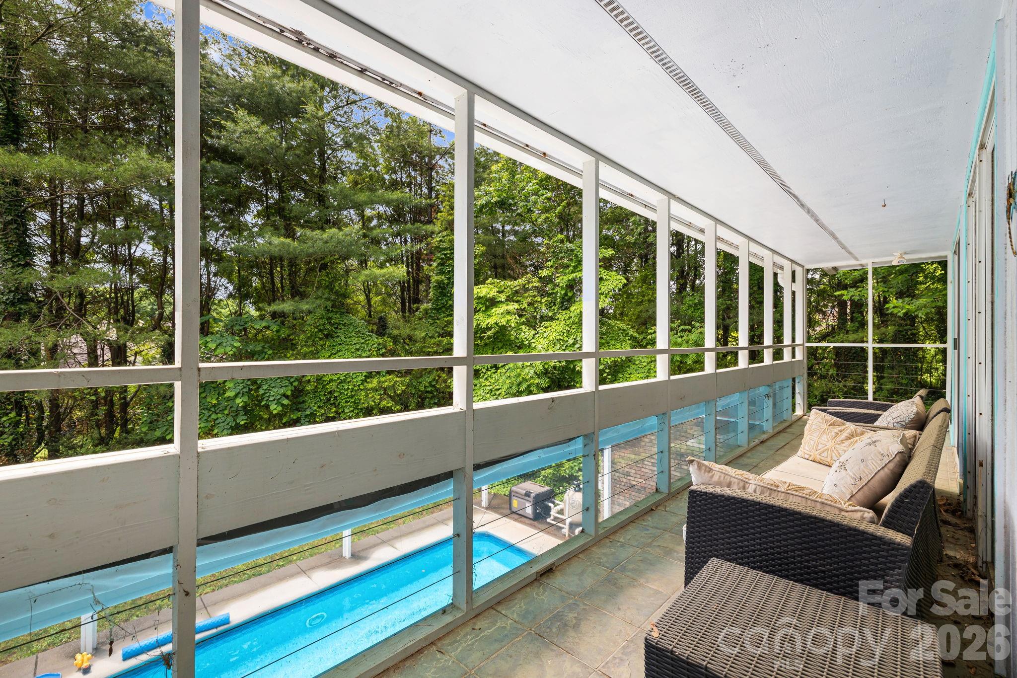 Retractable cover allows for swimming year round - 11 Beaumont Drive, Hendersonville