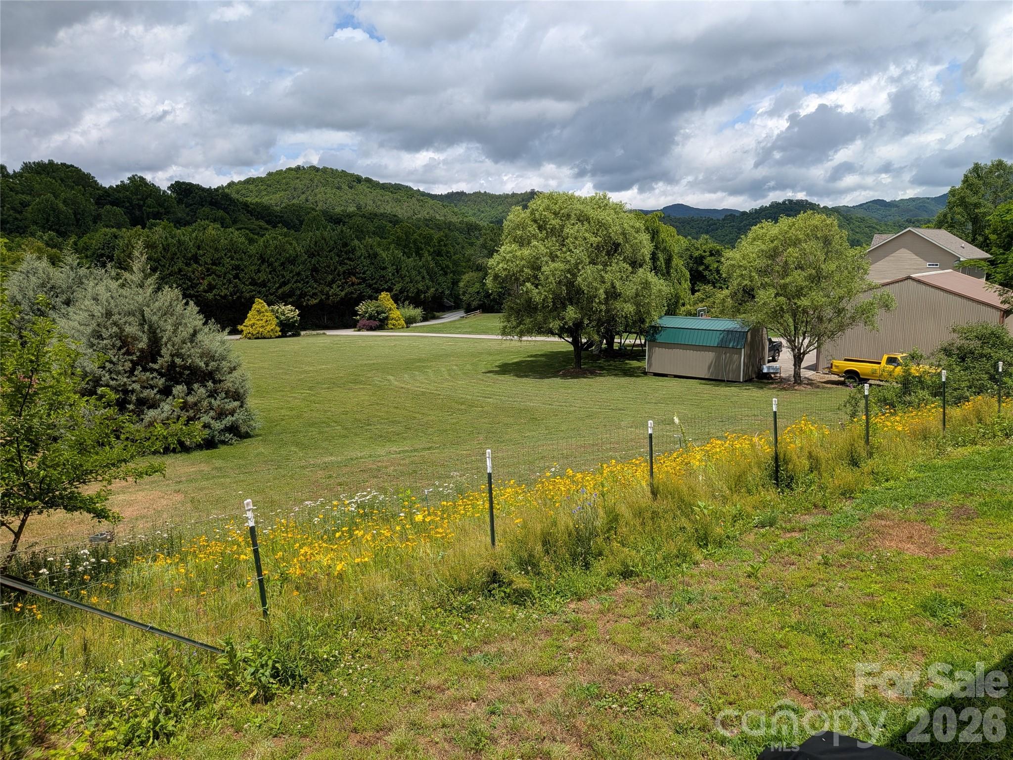 Fenced in portion of the yard, perfect for pets/kids! - 59 Ck Cabin Drive, Hot Springs