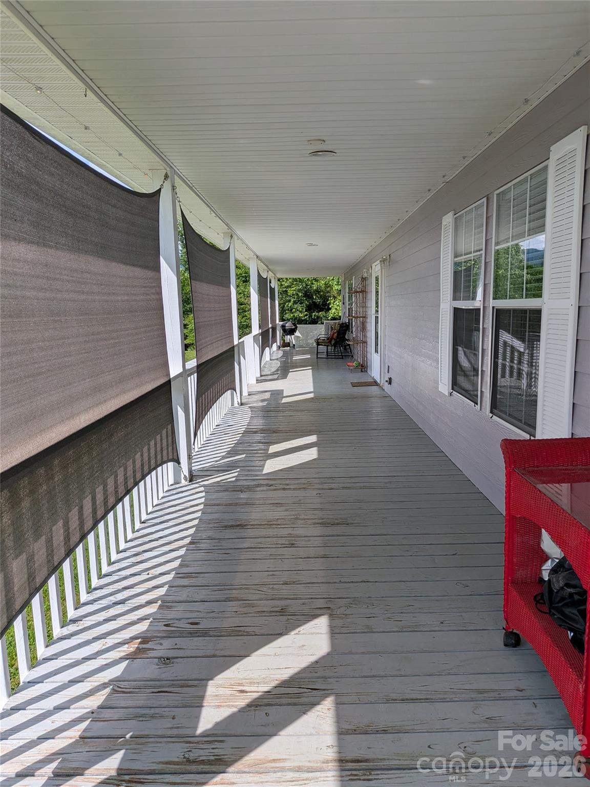 Sunny front porch, shades are included and easy to install/remove - 59 Ck Cabin Drive, Hot Springs