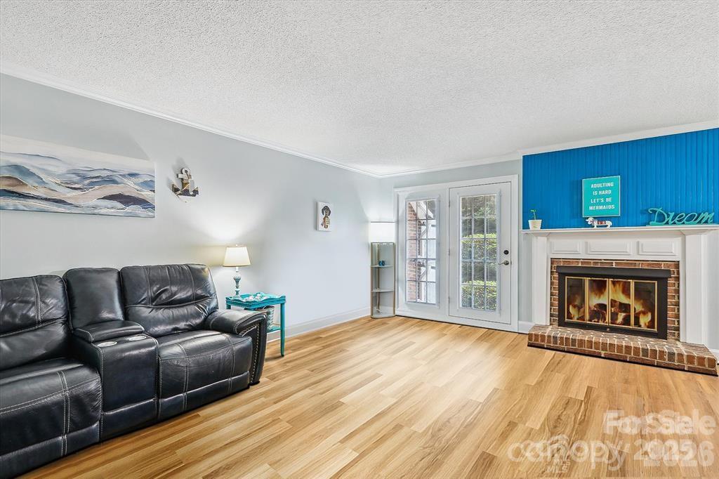 Main living areas have direct access to a second outdoor living space—perfect for enjoying morning coffee, entertaining guests, or relaxing in the fresh air - 806 Colony Oaks Drive, Monroe