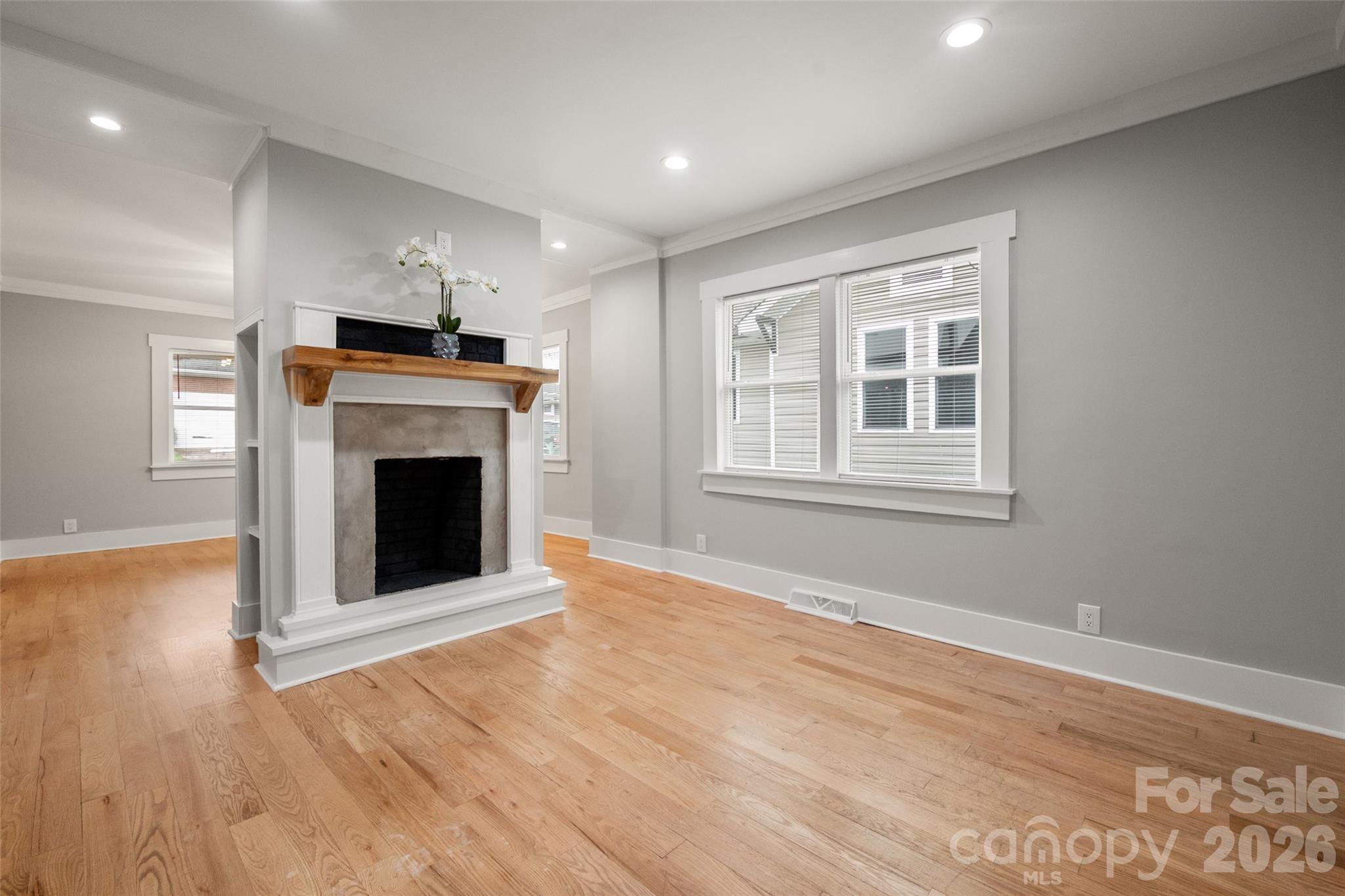 Double sided fireplace in the dining room - 174 Tournament Drive SW, Concord