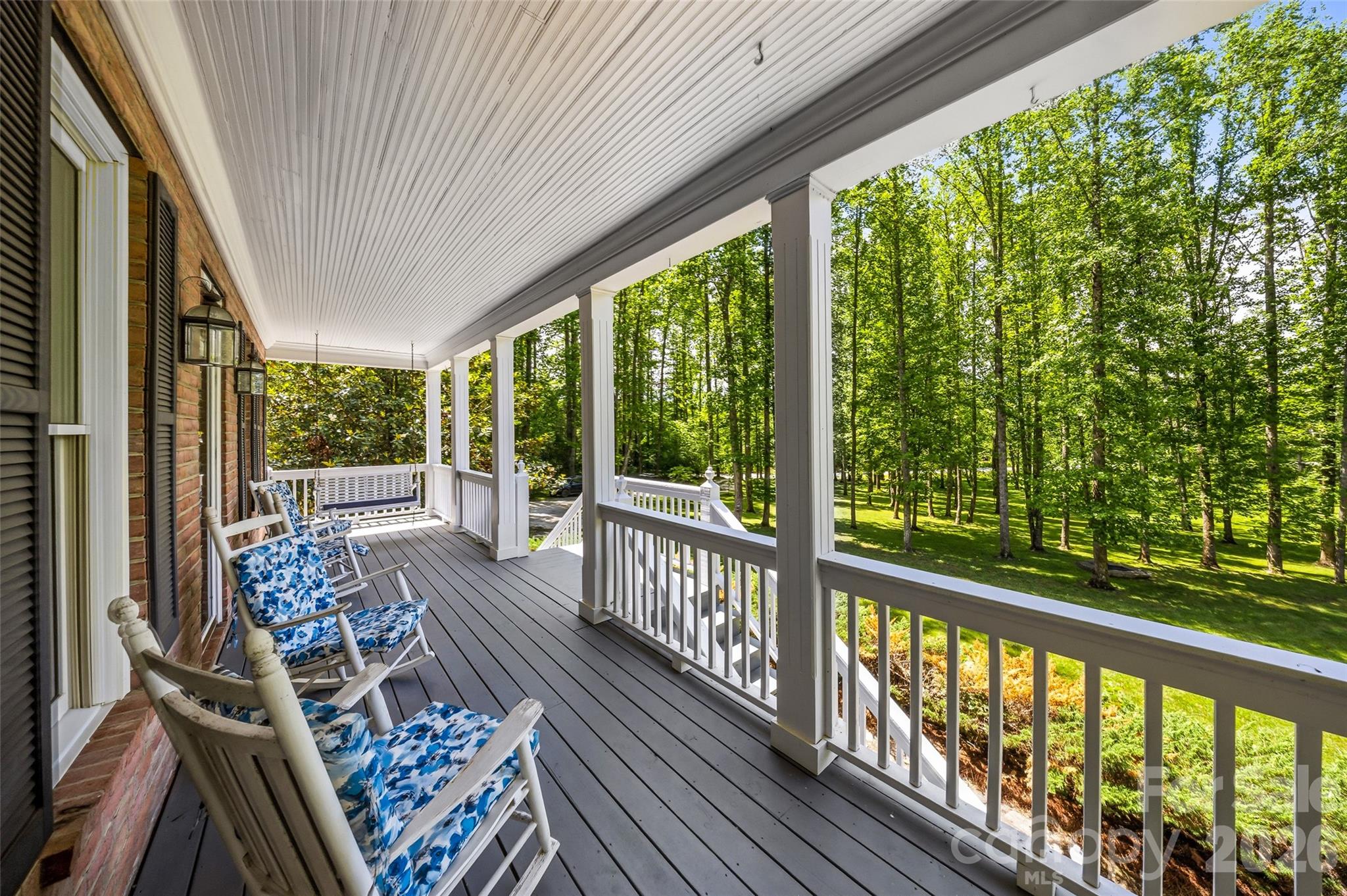 Main level front porch over looks fire pit and grounds - 243 Poplar Lane, Pisgah Forest