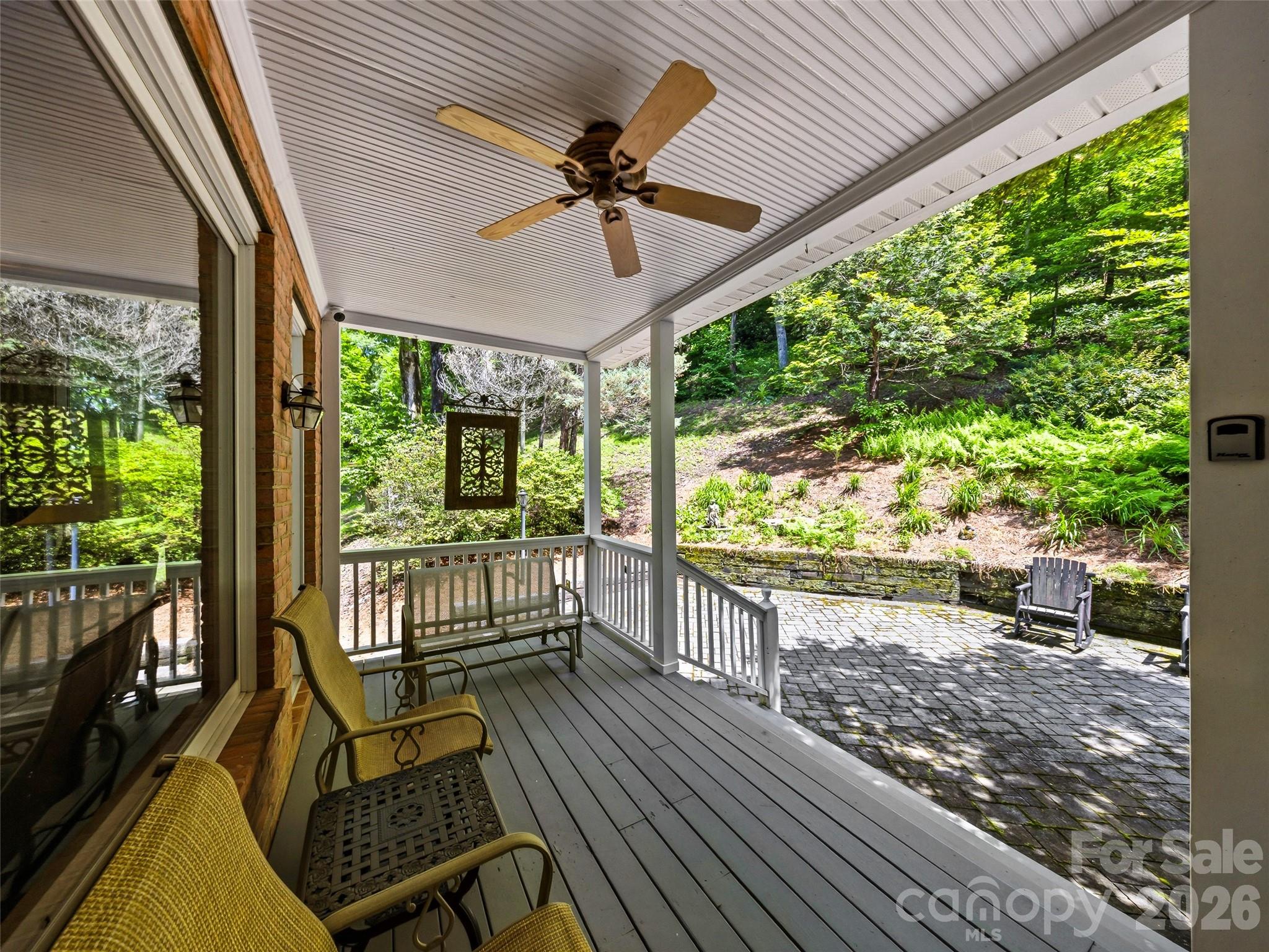 Rocking Chair porch on the back patio area - 243 Poplar Lane, Pisgah Forest