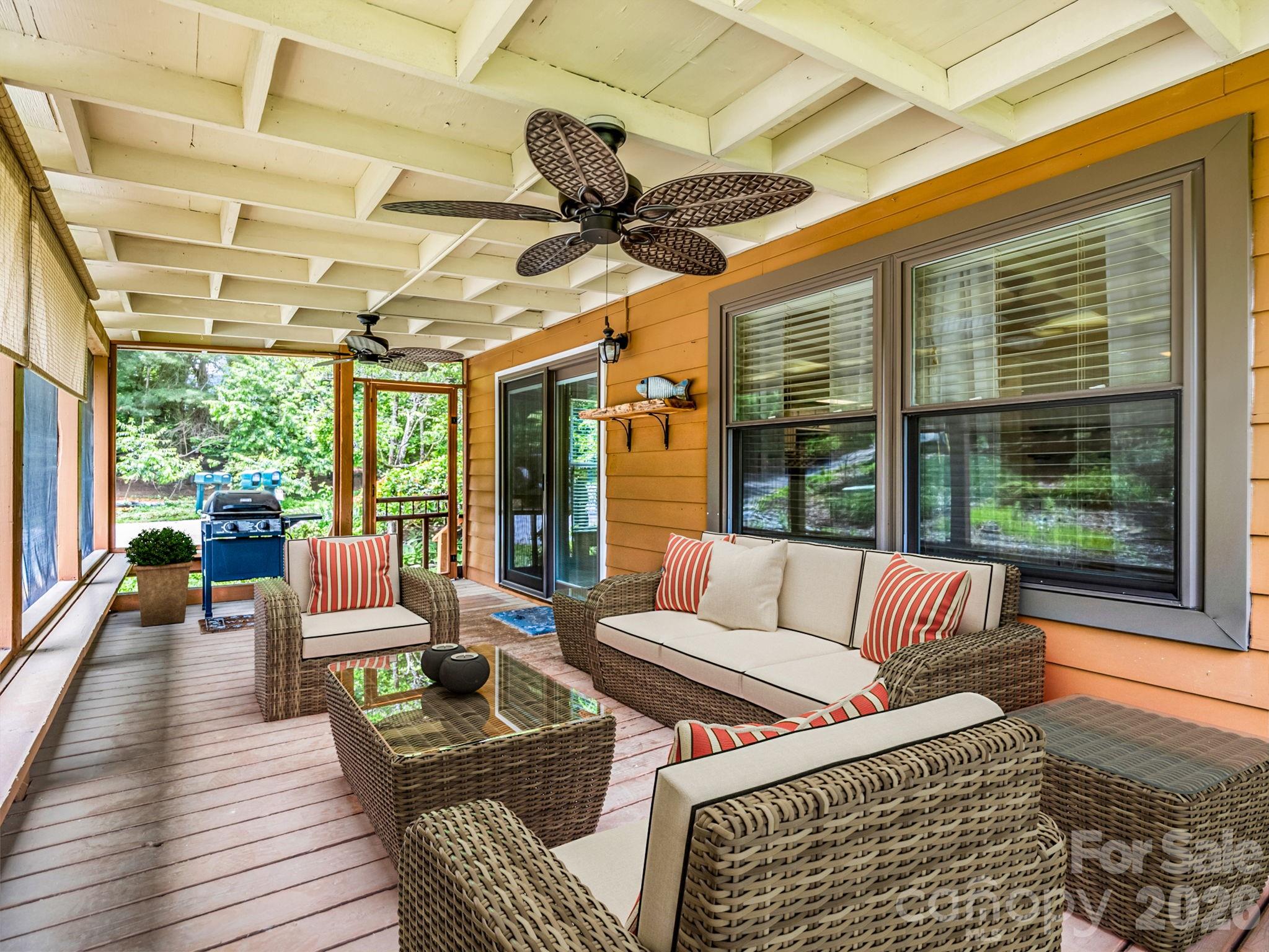 Virtual staging on spacious screened in porch, offers fan and grill with propane conveys - 117 Willow Way, Hendersonville