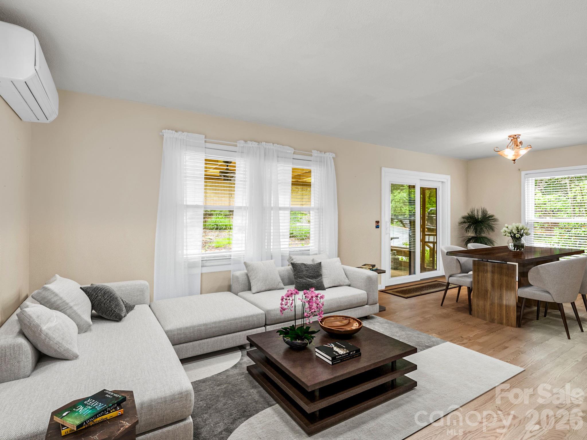 Virtual staging - Open floor plan on main level living, dining and kitchen - 117 Willow Way, Hendersonville