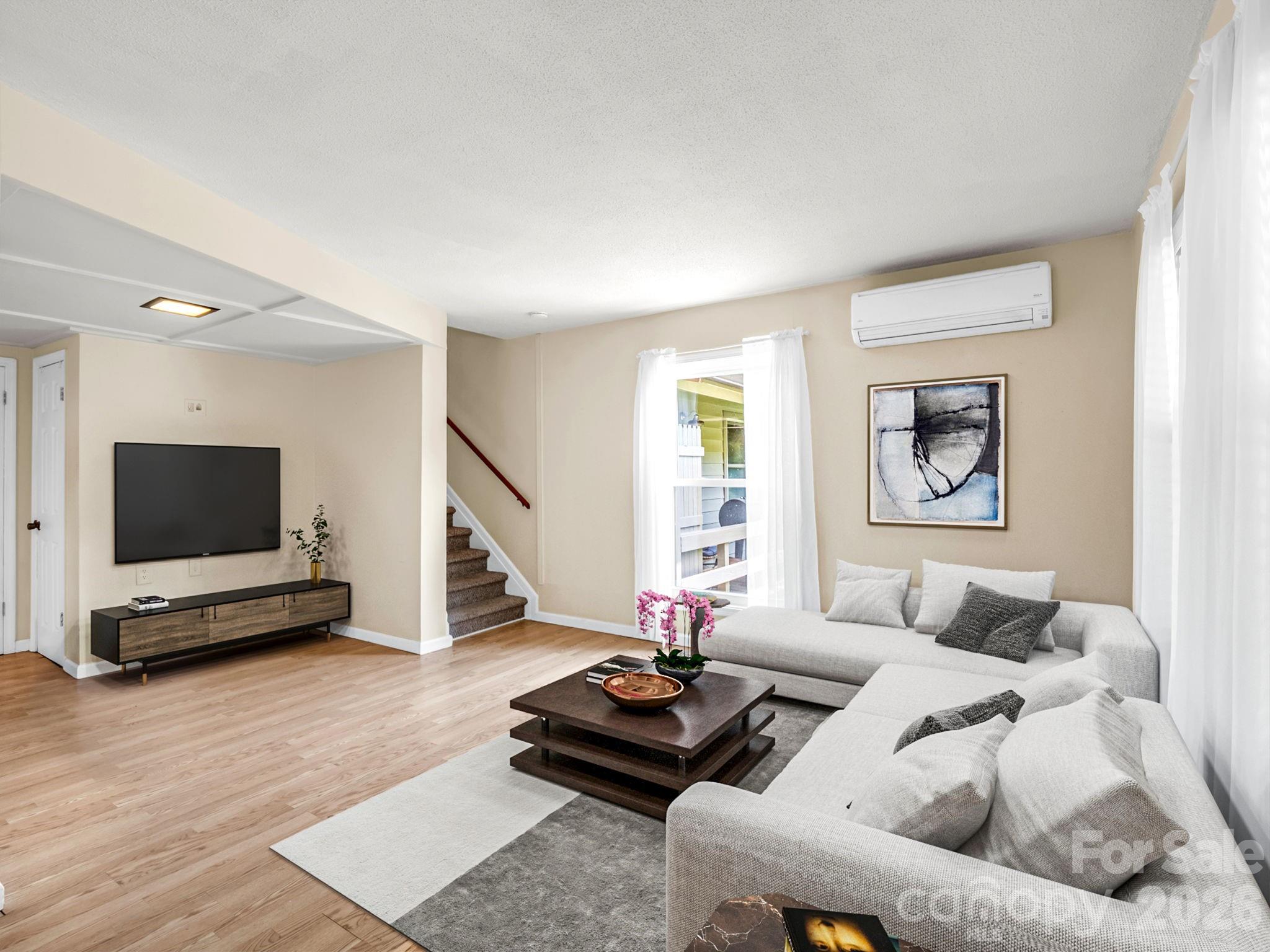 Virtual staging- Open floor plan on main level living, dining and kitchen - 117 Willow Way, Hendersonville