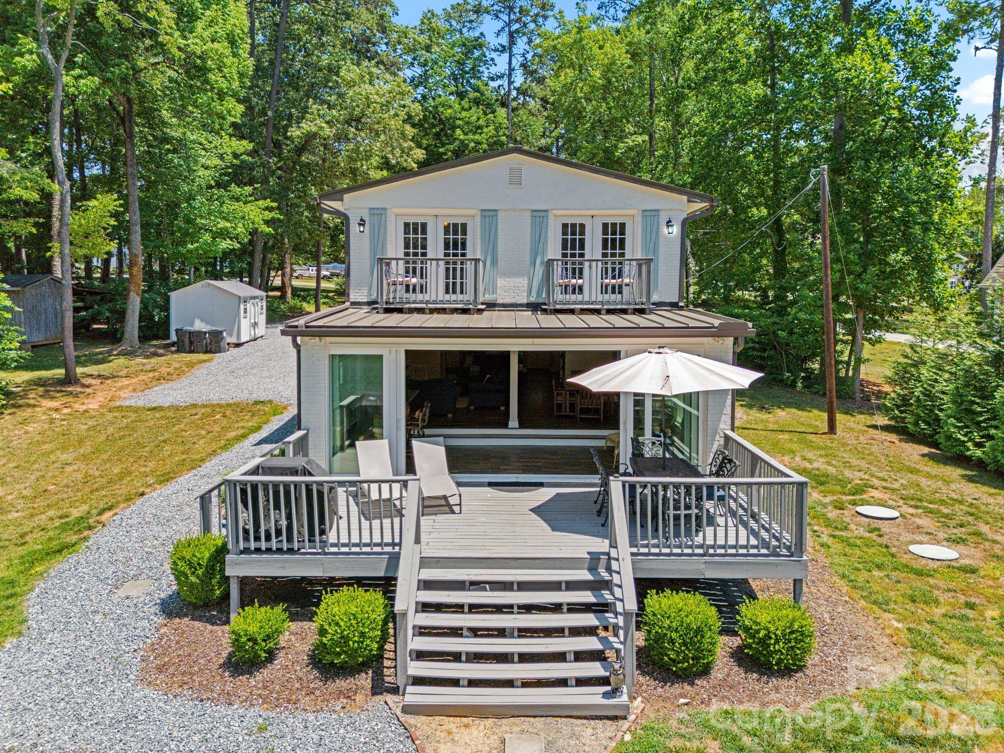 Expansive back deck adds to the ease outdoor enjoyment - 383 Sundown Road, Mooresville