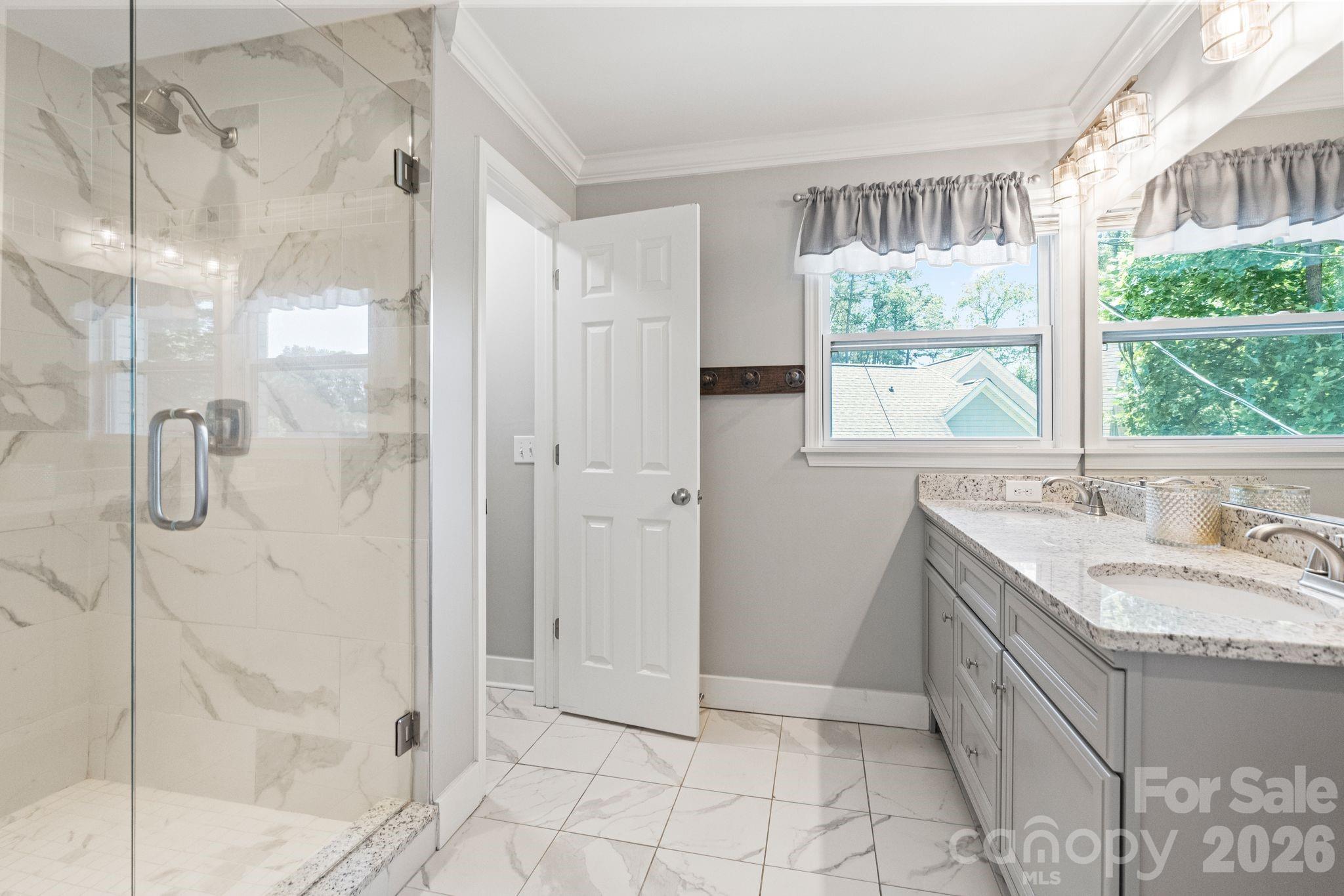 Large walk-in tile shower with dual vanities - 383 Sundown Road, Mooresville