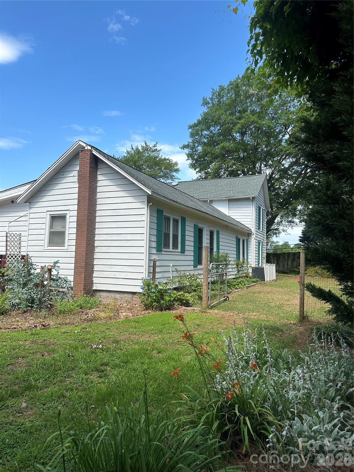 Back view of house - 1407 N College Avenue, Newton
