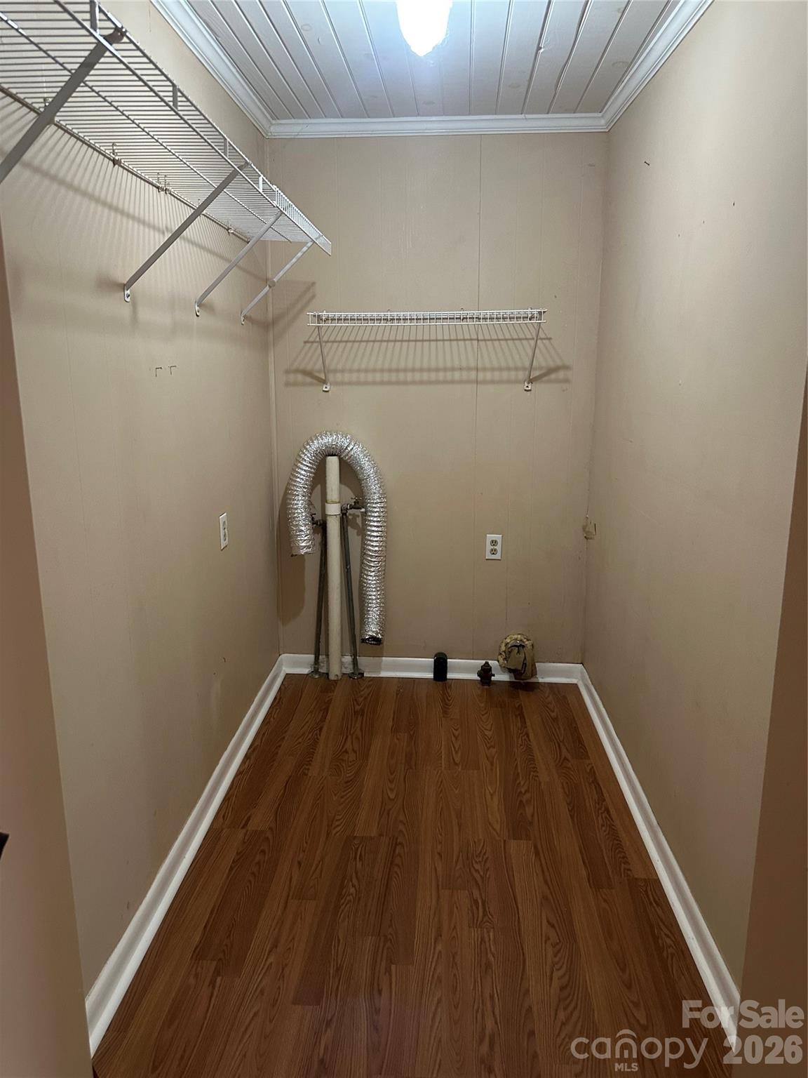Inside laundry room. - 1407 N College Avenue, Newton