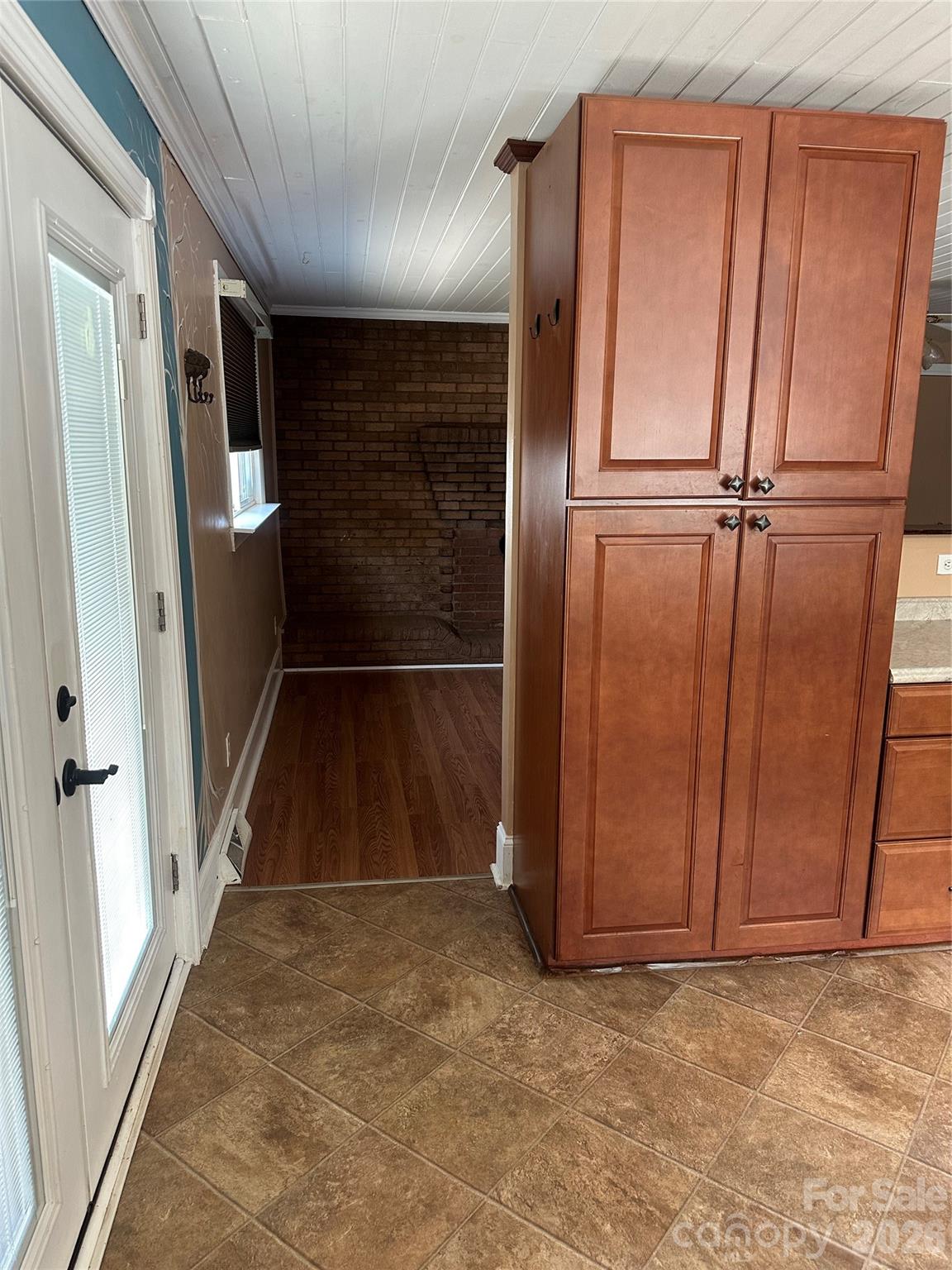 The other pantry with slid out shelves. - 1407 N College Avenue, Newton