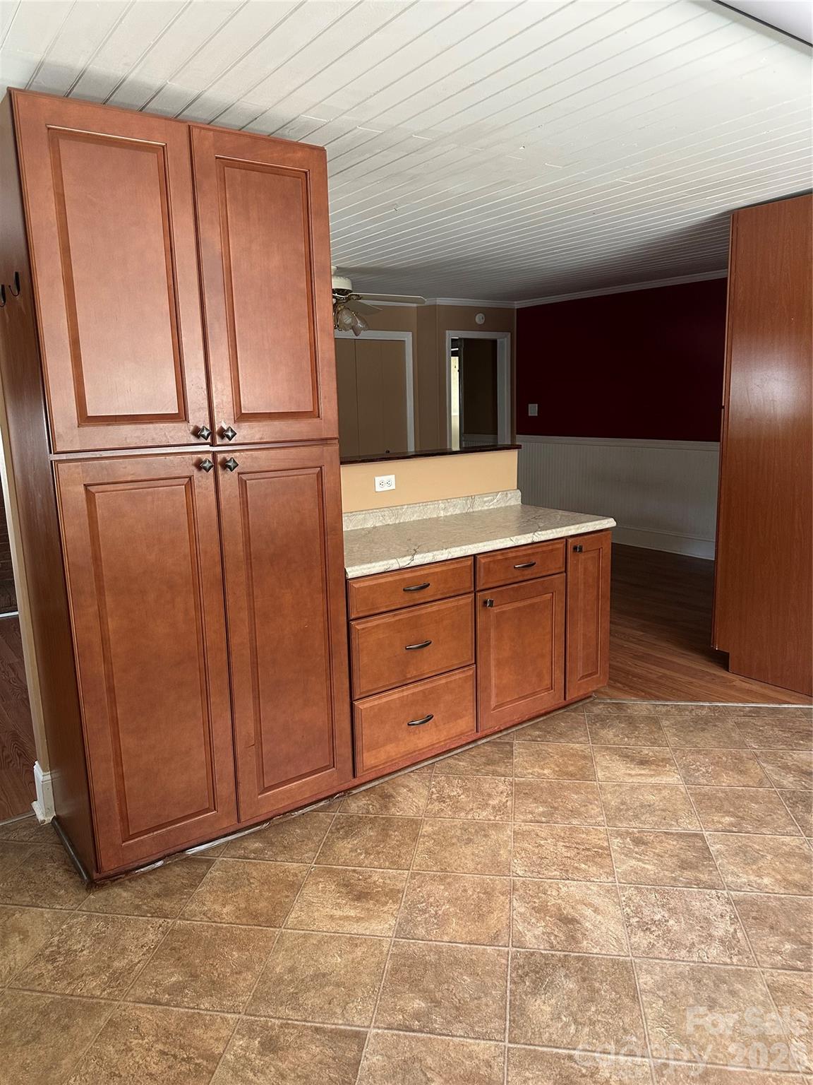 Pantry and prep counter in kitchen. - 1407 N College Avenue, Newton
