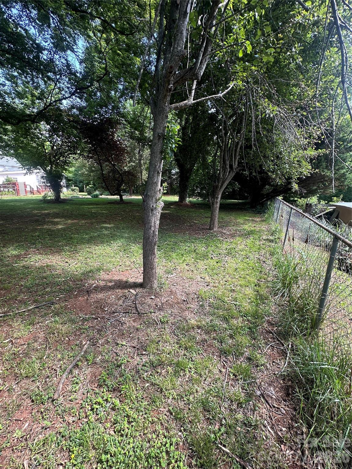 some more of the back yard and fence. - 1407 N College Avenue, Newton