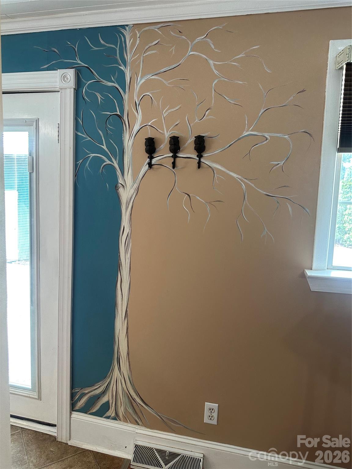 Some special artwork in kitchen and dinning room. - 1407 N College Avenue, Newton