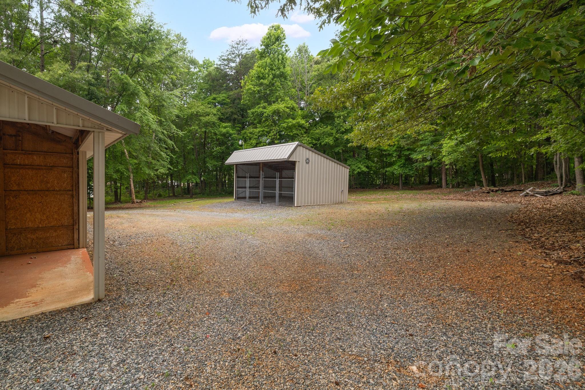 Detached tractor shed, can park small cars in it also - 104 Willowbrook Drive, Thomasville