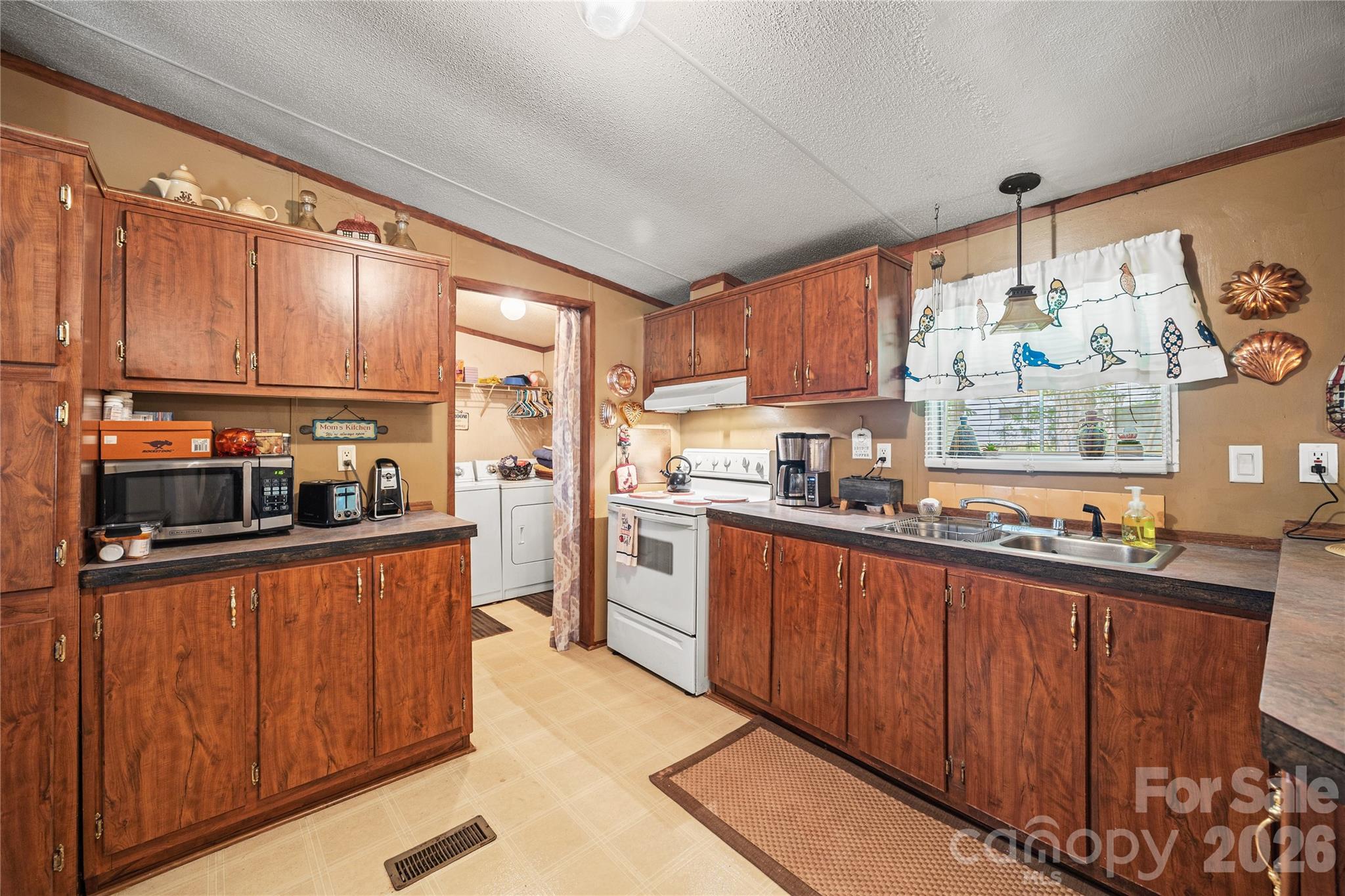 Lots of storage in this kitchen. - 323 Carlyle Road, Troutman