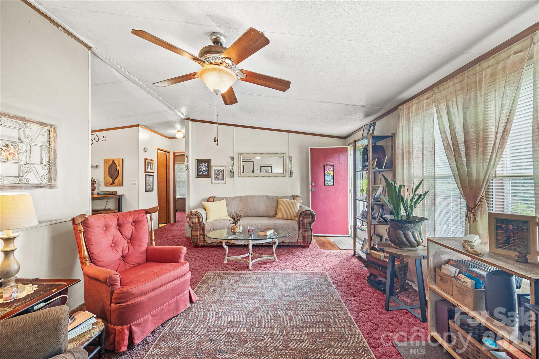 Large windows allow lots of natural light. - 323 Carlyle Road, Troutman