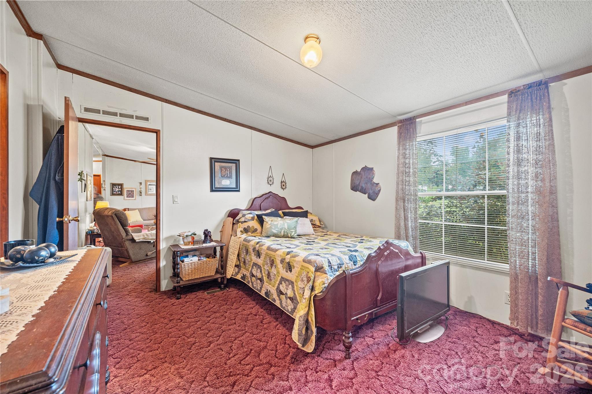 Split floorplan where bedrooms are on opposite sides of the home. - 323 Carlyle Road, Troutman