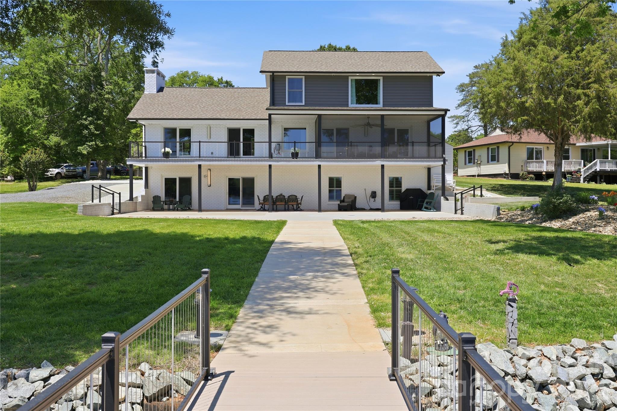 View of home from the lakeside - 420 Skysail Road, Salisbury