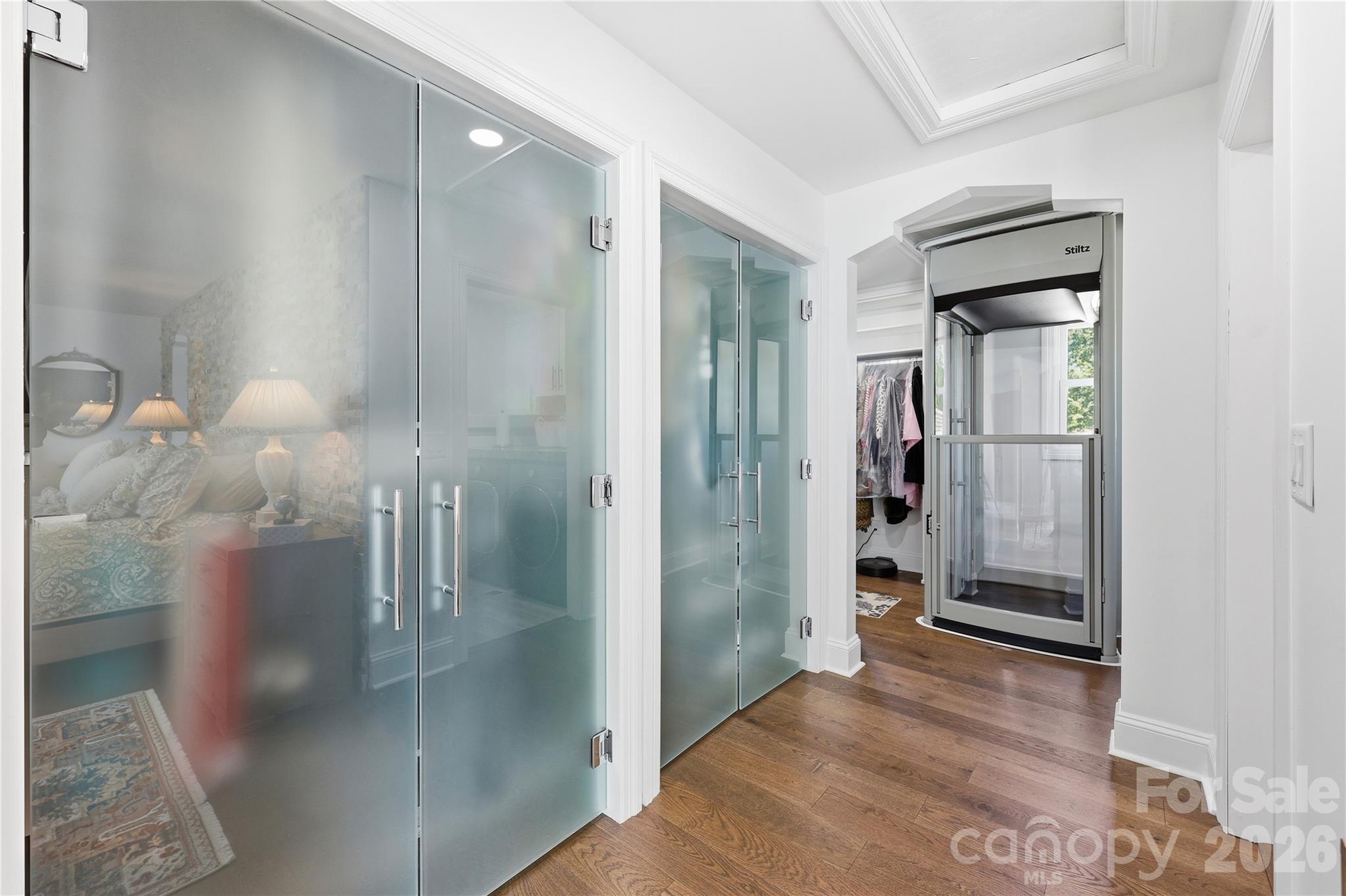 Closets leading to large walk in closet and elevator - 420 Skysail Road, Salisbury