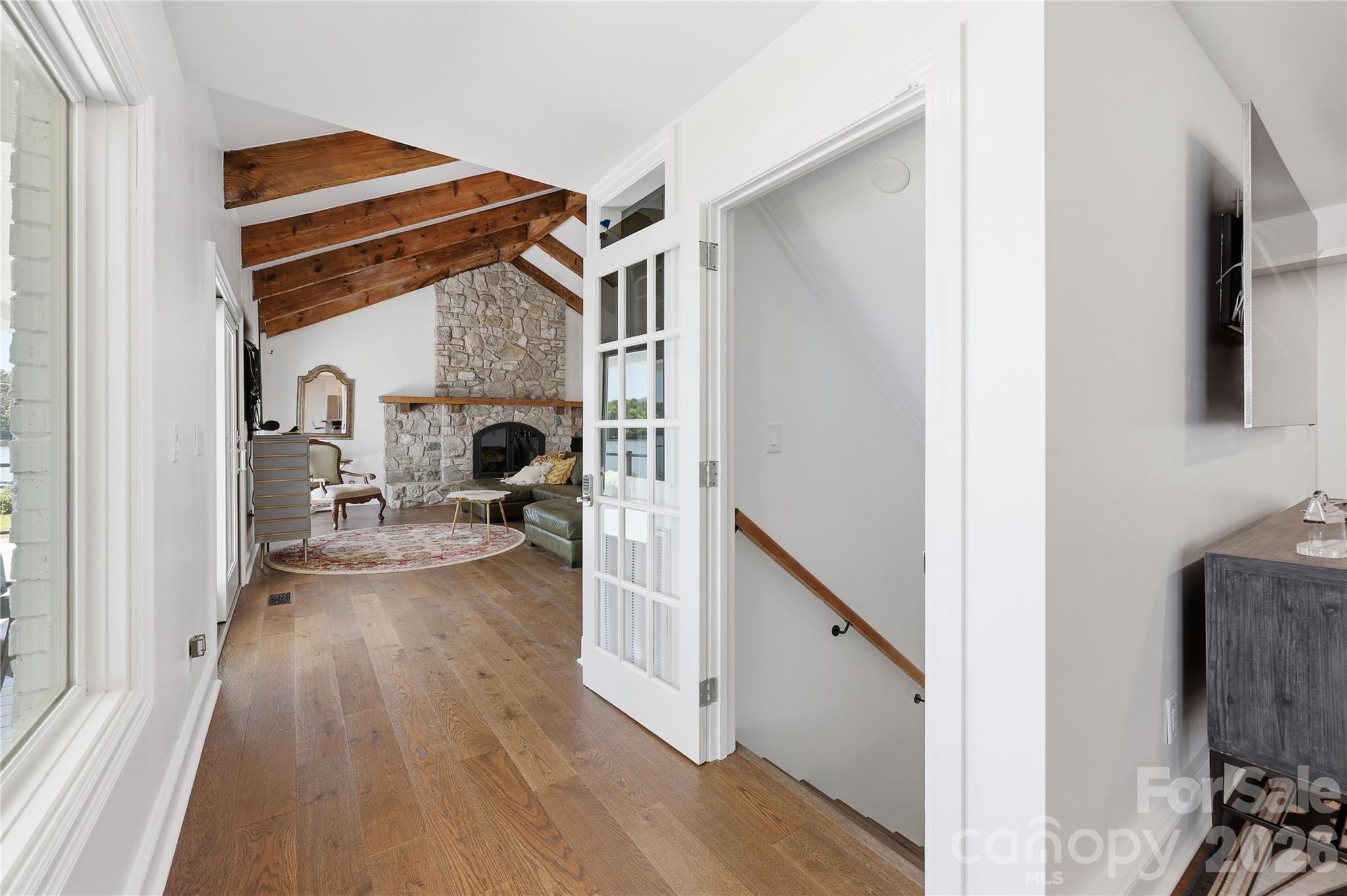 View of greatroom and stairway to lower level - 420 Skysail Road, Salisbury