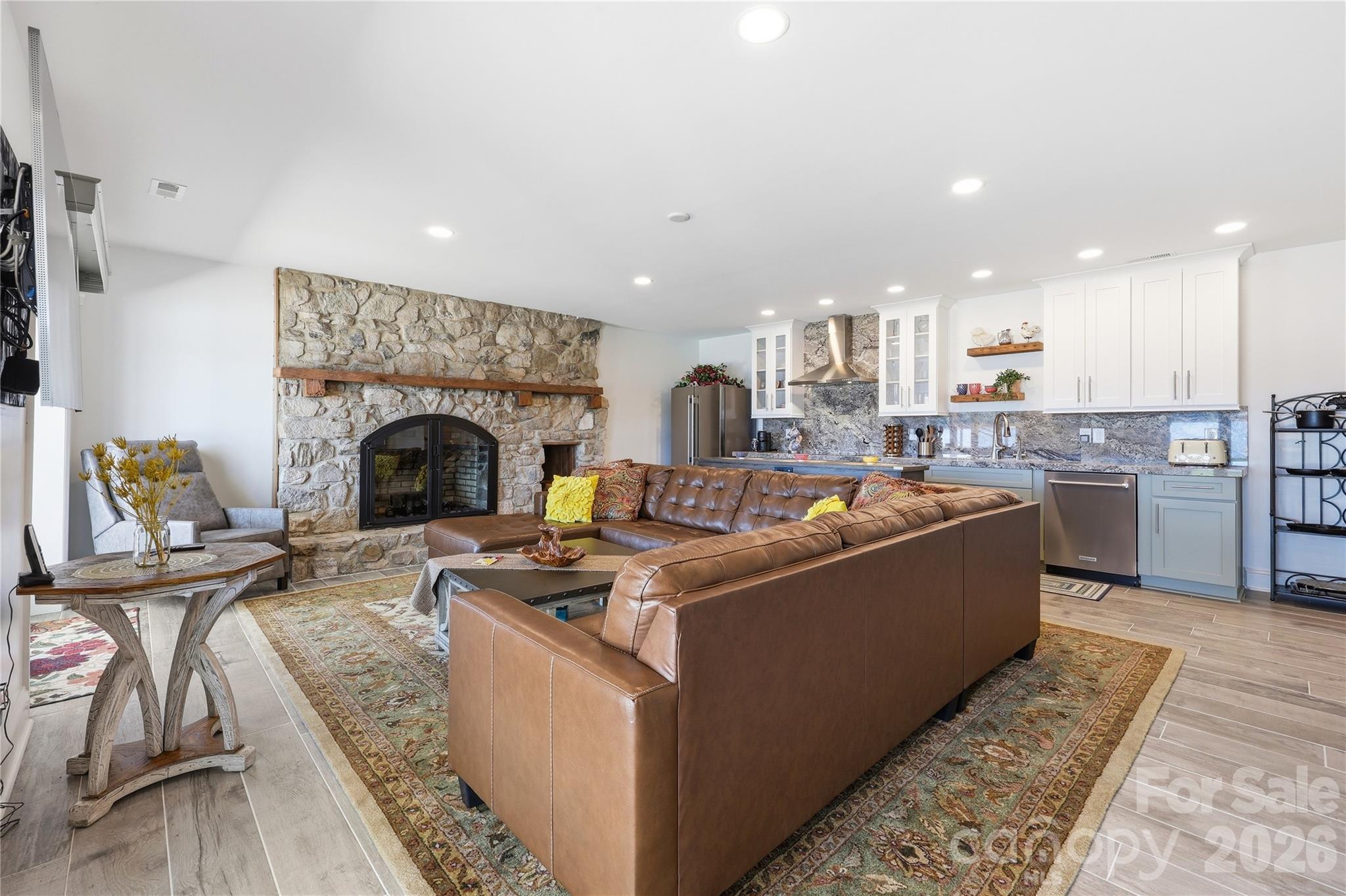 Second greatroom with fireplace and kitchen - 420 Skysail Road, Salisbury