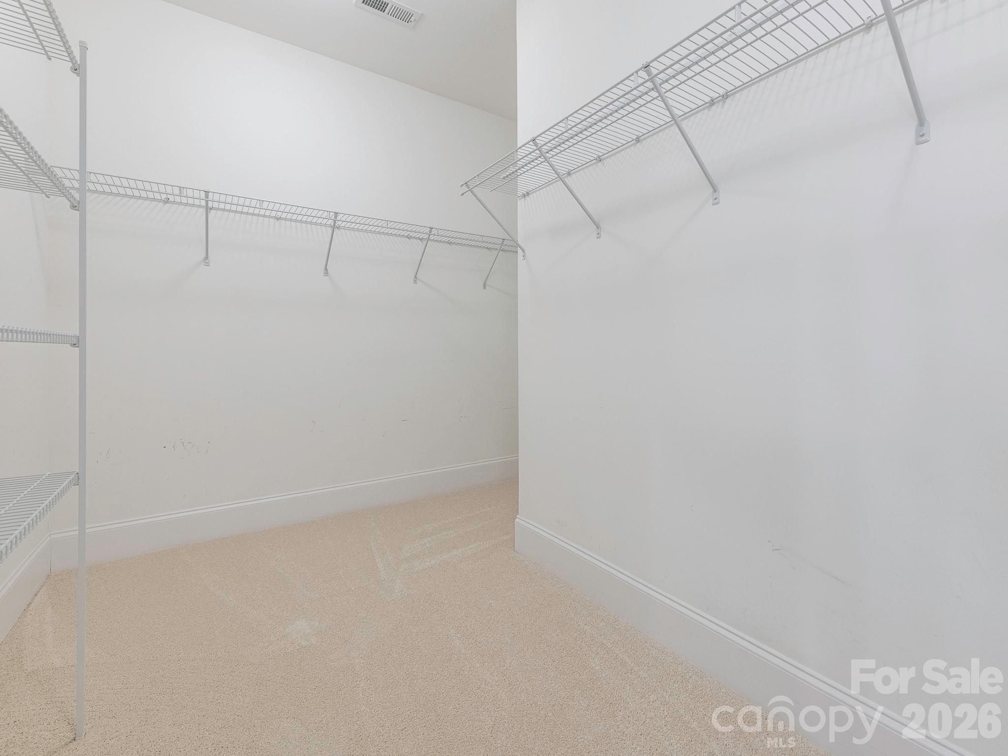 Large walk-in closet completes the primary bedroom suite - 4534 Ideal Way, Harrisburg