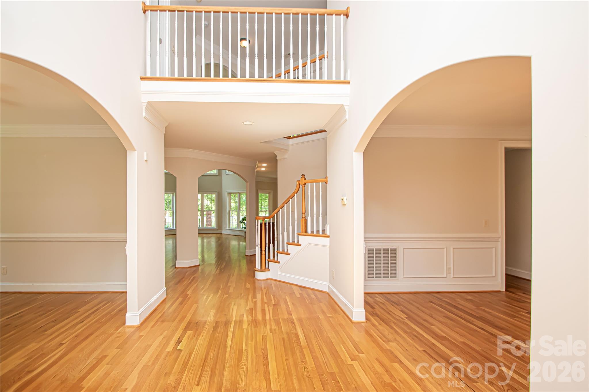 2-story entryway with hardwood floors throughout. - 1015 Estate Lane, Matthews