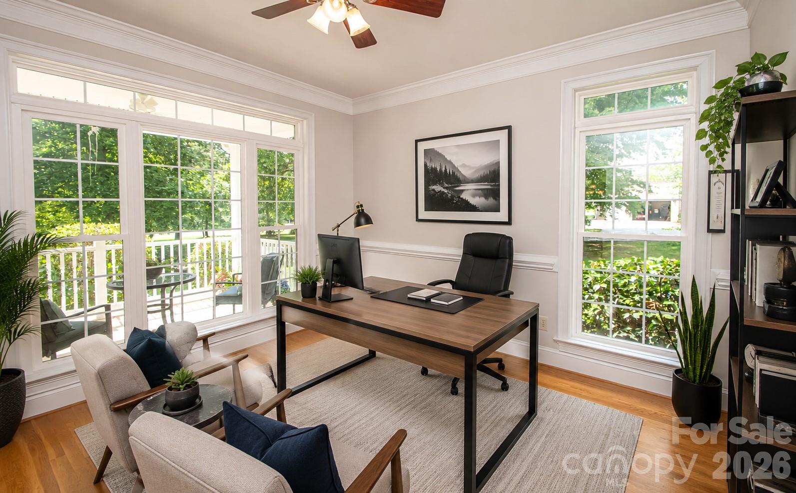Office is locate as you walk in the door to the left. This is what it could look like decorate. - 1015 Estate Lane, Matthews