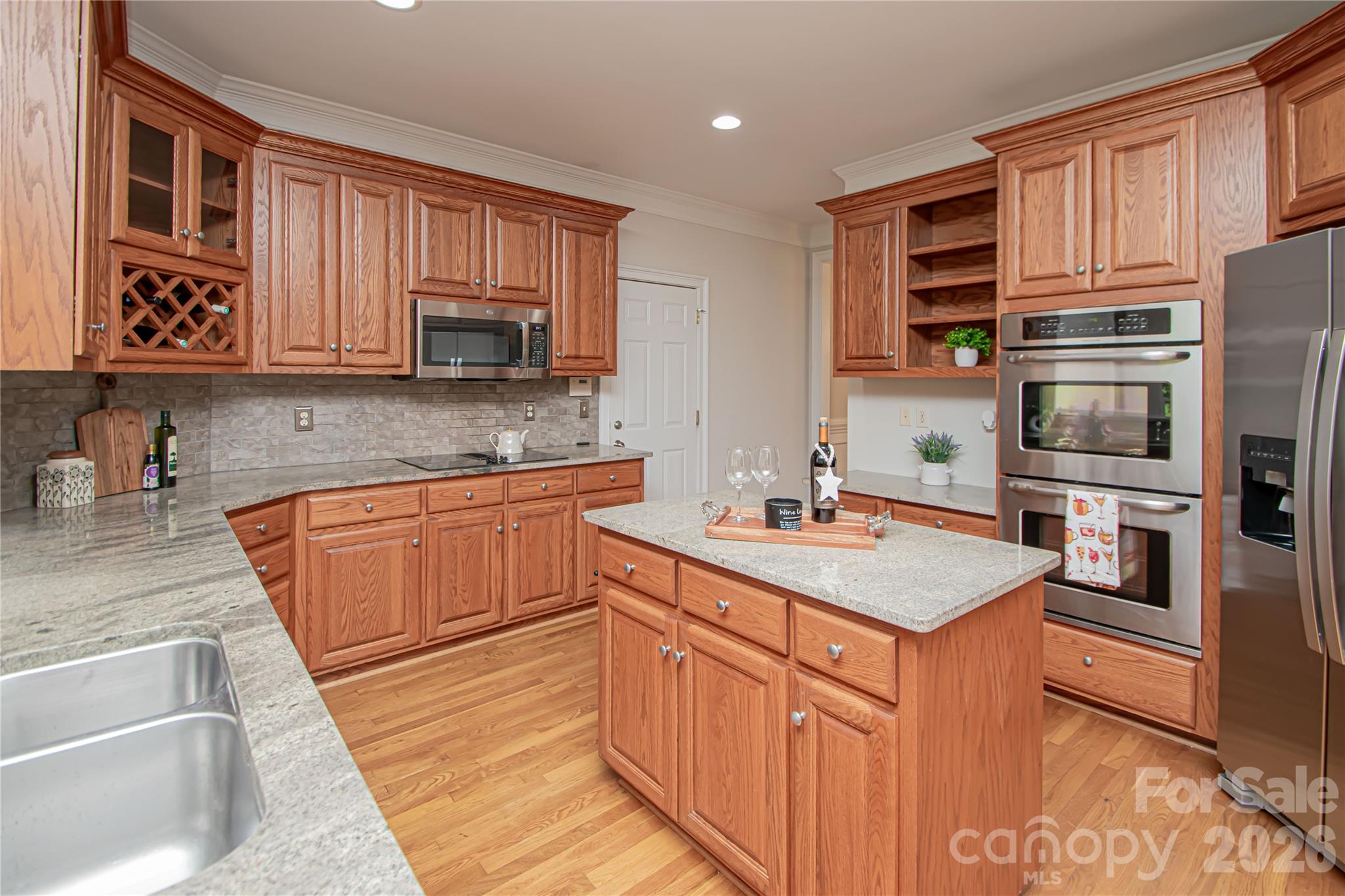 Large kitchen with plenty of cabinets for storage. - 1015 Estate Lane, Matthews