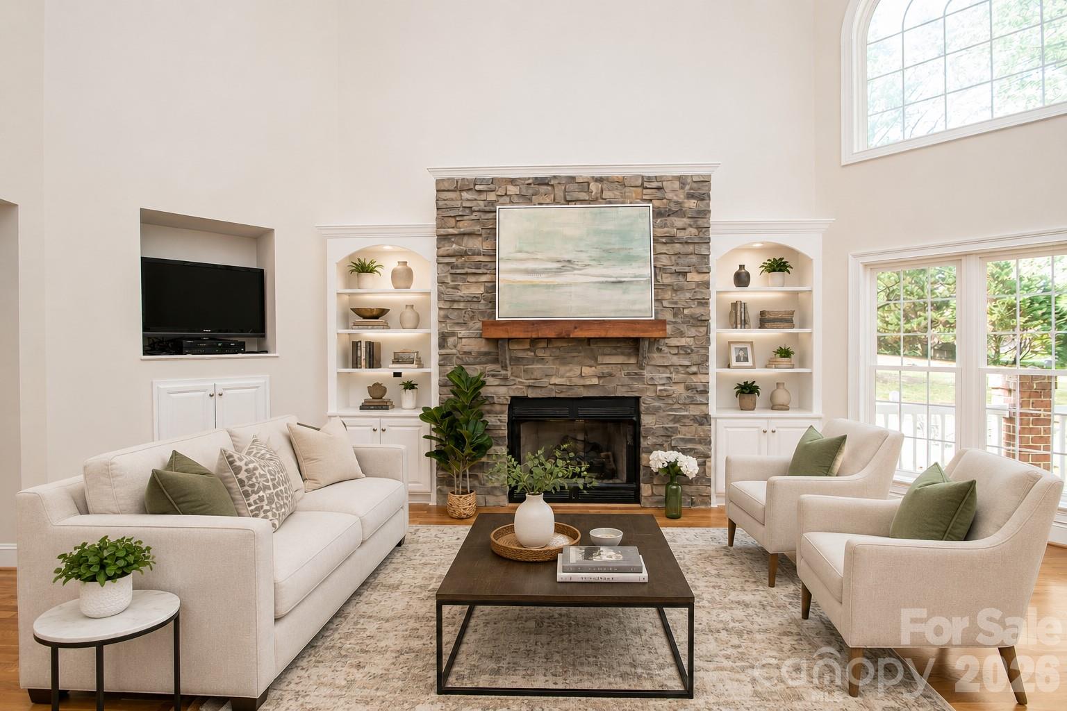 Image of what the great room could look like with cabinets painted white. - 1015 Estate Lane, Matthews
