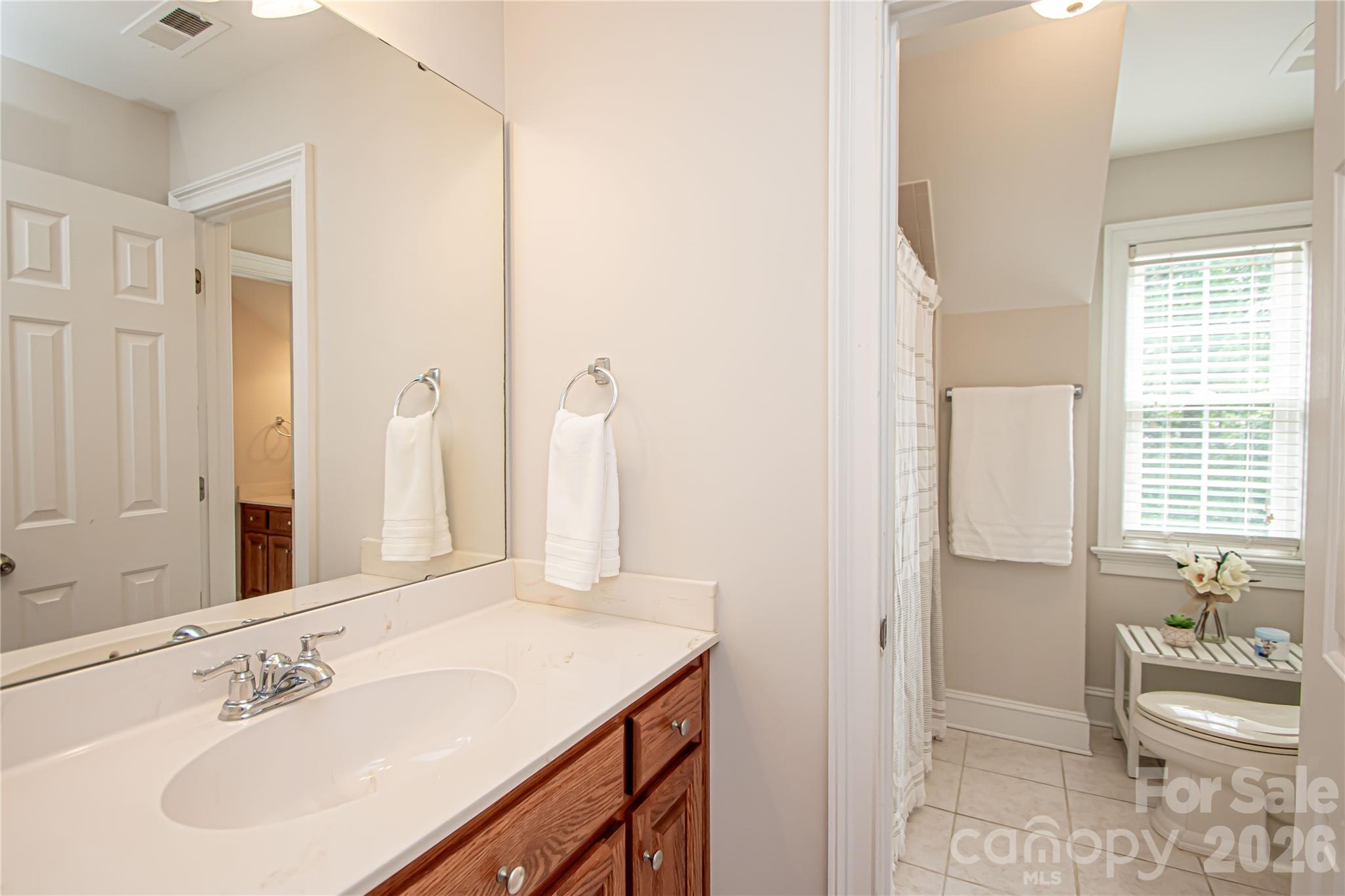 Jack and Jill bathroom. - 1015 Estate Lane, Matthews